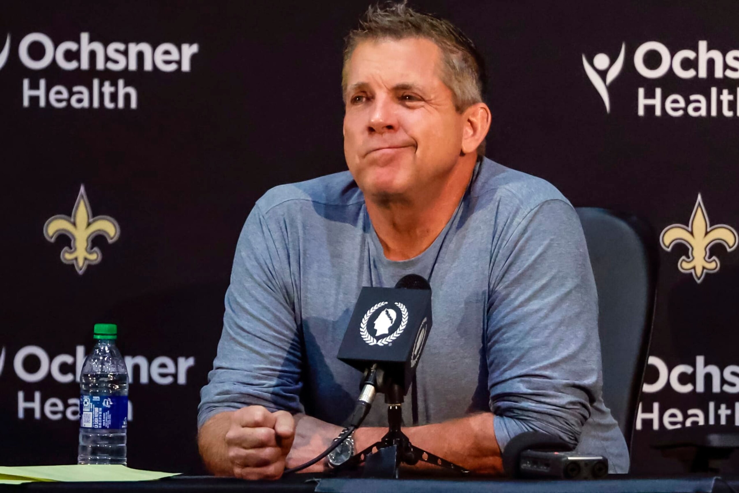 Sean Payton reacts during an NFL football press conference announcing his resignation as head coach of the New Orleans Saints, Tuesday, Jan. 25, 2022, in Metairie, La. (AP Photo/Derick Hingle)