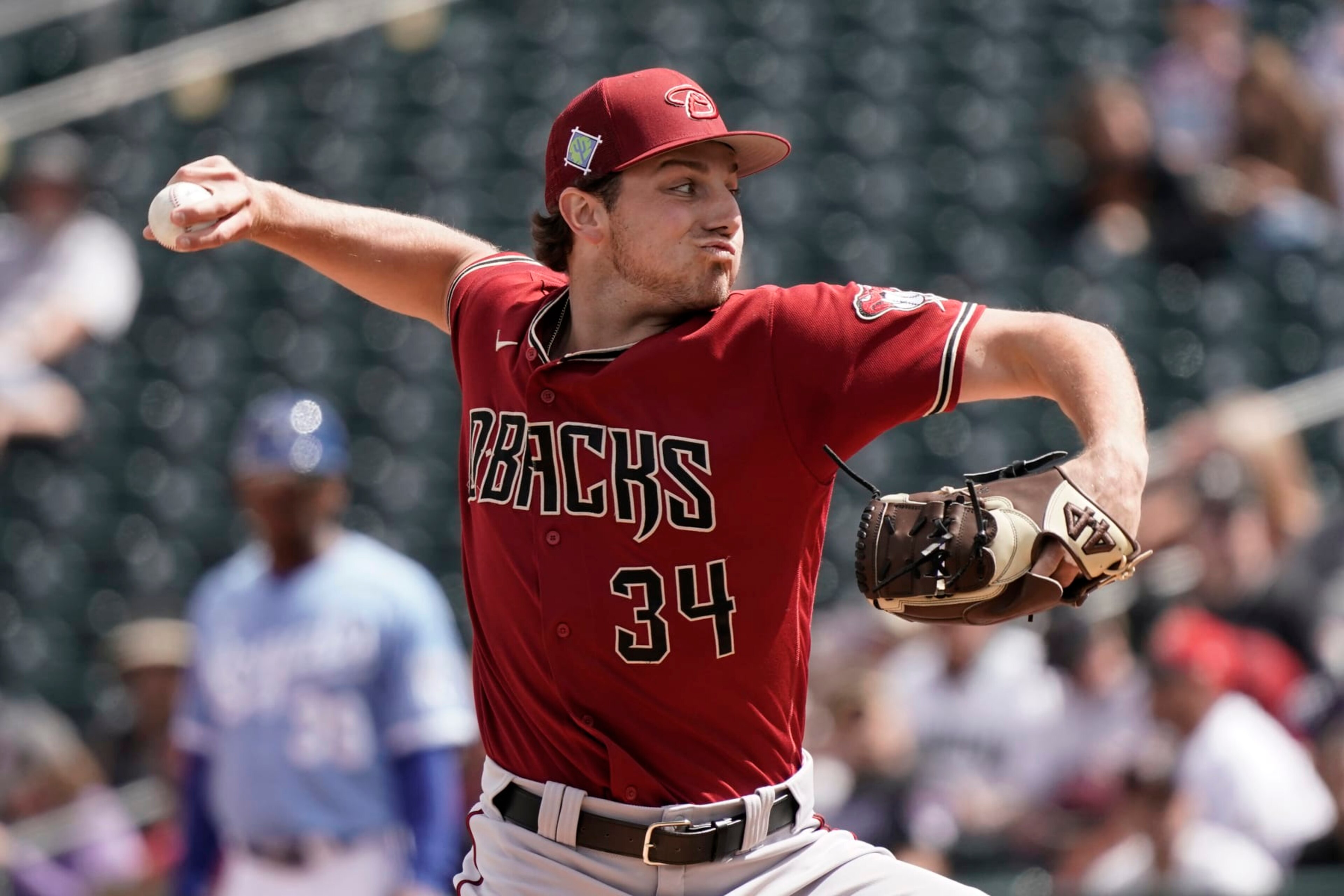 Arizona Diamondbacks starting pitcher Brandon Pfaadt throws during the second inning of a spring training baseball game against the Kansas City Royals Sunday, March 20, 2022, in Surprise, Ariz. (AP Photo/Charlie Riedel)