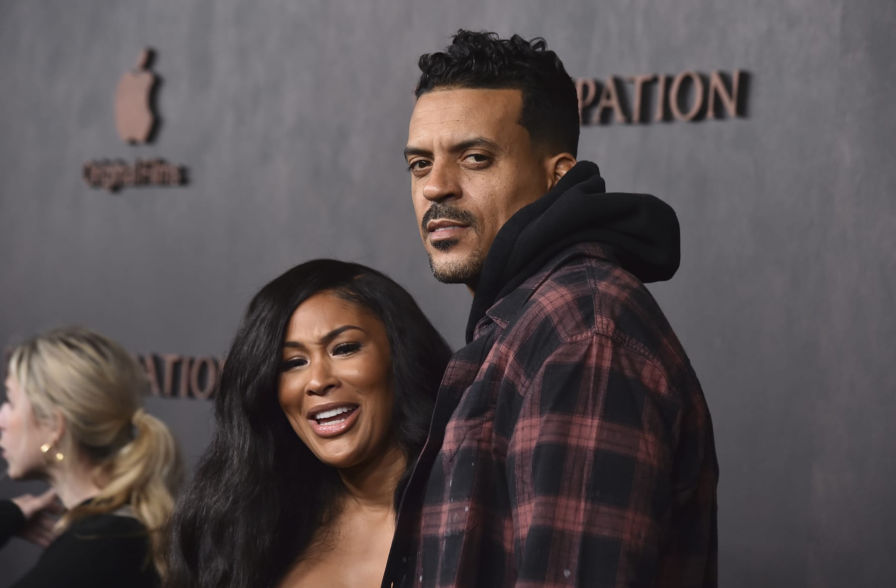 Anansa Sims, left, and Matt Barnes arrive at the premiere of "Emancipation" on Wednesday, Nov. 30, 2022, at the Regency Village Theatre in Los Angeles. (Photo by Jordan Strauss/Invision/AP)