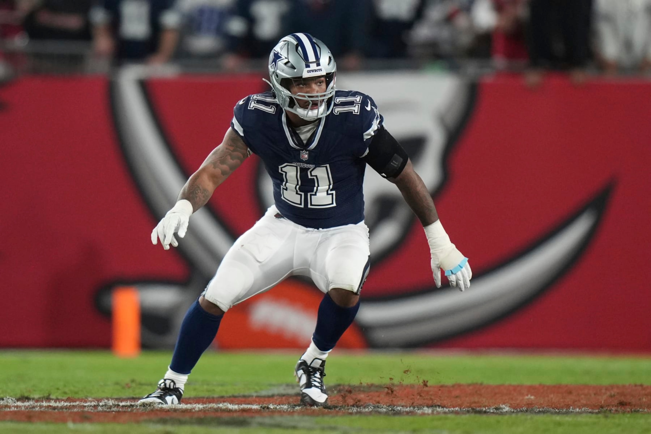Dallas Cowboys linebacker Micah Parsons (11) adjust to a completed pass during an NFL wild-card football game against the Tampa Bay Buccaneers, Monday, Jan. 16, 2023, in Tampa, Fla. (AP Photo/Peter Joneleit)
