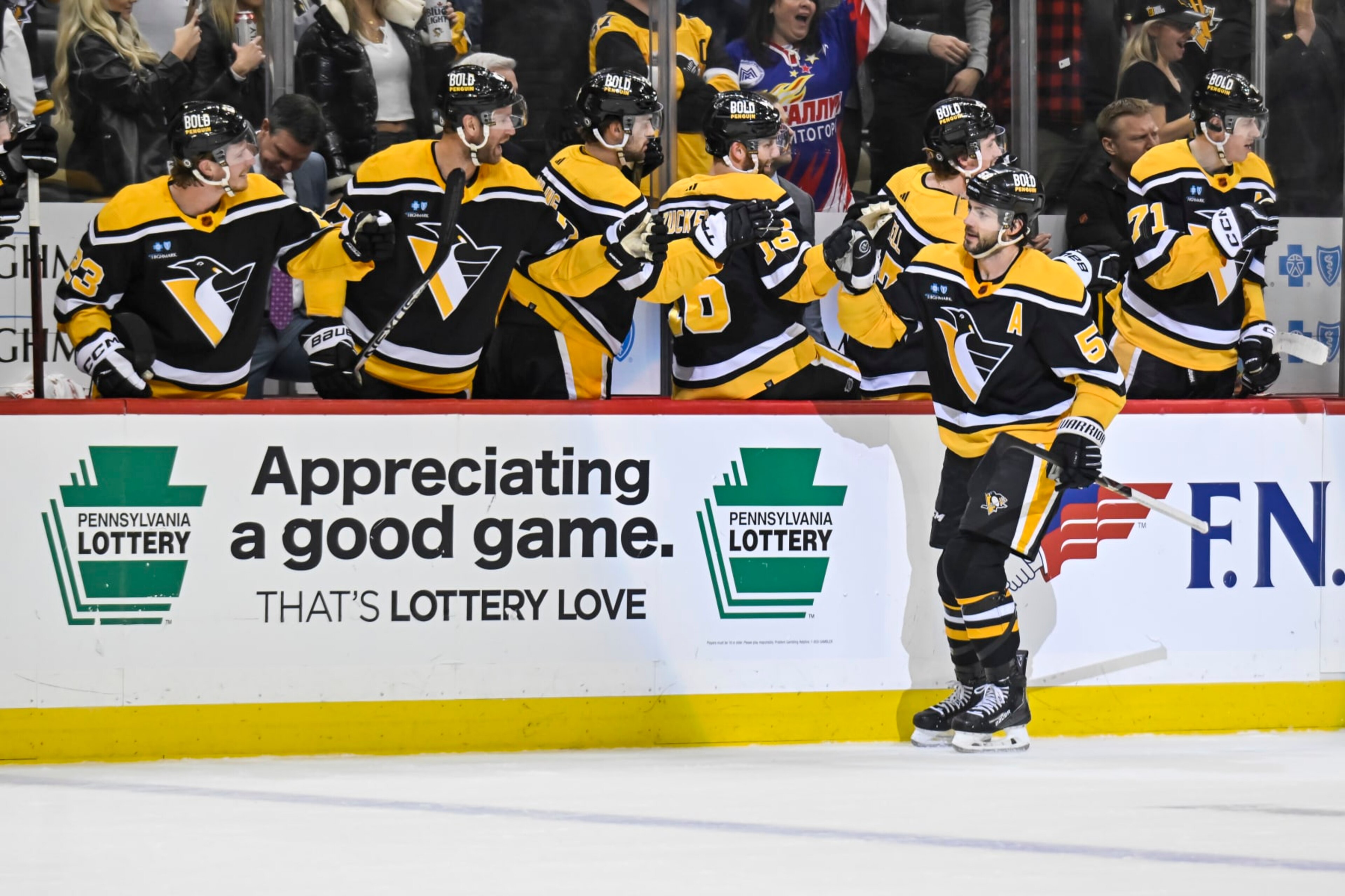 PITTSBURGH, PA - JANUARY 24: Pittsburgh Penguins Defenseman Kris Letang (58) celebrates his goal with the bench during the first period in the NHL game between the Pittsburgh Penguins and the Florida Panthers on January 24, 2023, at PPG Paints Arena in Pittsburgh, PA. (Photo by Jeanine Leech/Icon Sportswire via Getty Images) PITTSBURGH, PA - JANUARY 24: Pittsburgh Penguins Defenseman Kris Letang (58) celebrates his goal with the bench during the first period in the NHL game between the Pittsburgh Penguins and the Florida Panthers on January 24, 2023, at PPG Paints Arena in Pittsburgh, PA. (Photo by Jeanine Leech/Icon Sportswire via Getty Images)