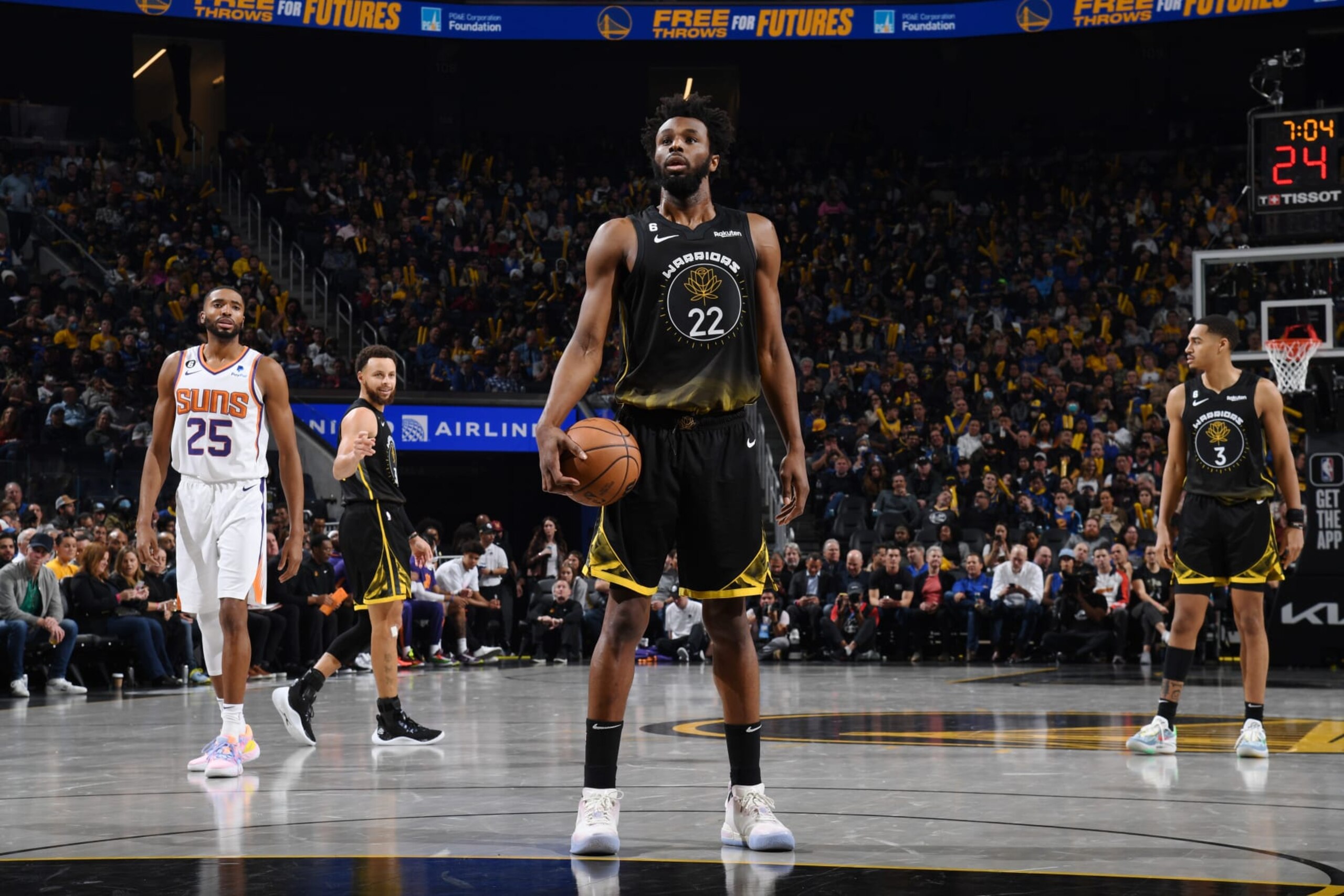 SAN FRANCISCO, CA - JANUARY 10: Andrew Wiggins #22 of the Golden State Warriors shoots the ball during the game against the Phoenix Suns on January 10, 2023 at Chase Center in San Francisco, California. NOTE TO USER: User expressly acknowledges and agrees that, by downloading and or using this photograph, user is consenting to the terms and conditions of Getty Images License Agreement. Mandatory Copyright Notice: Copyright 2022 NBAE (Photo by Noah Graham/NBAE via Getty Images)