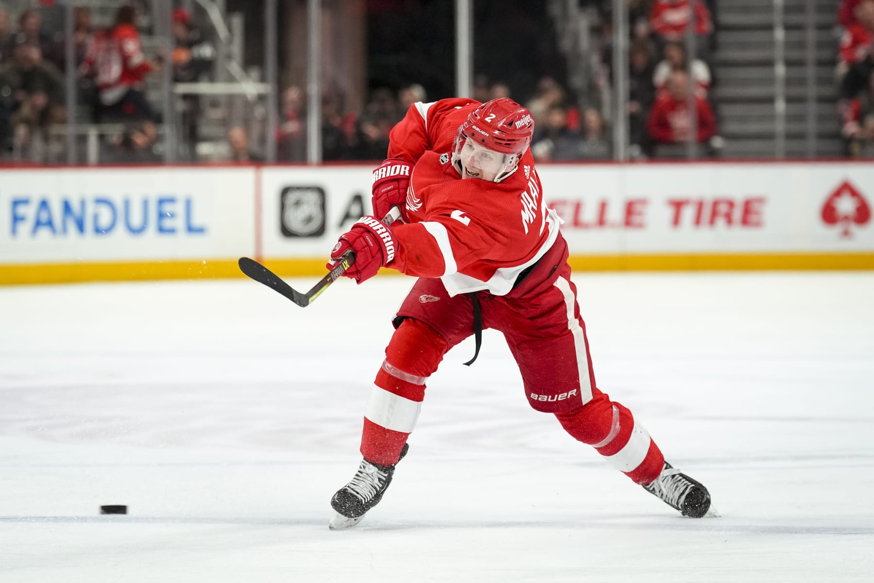 DETROIT, MICHIGAN - JANUARY 14: Olli Maatta #2 of the Detroit Red Wings shoots the puck against the Columbus Blue Jackets during the second period of the game at Little Caesars Arena on January 14, 2023 in Detroit, Michigan. (Photo by Nic Antaya/Getty Images)
