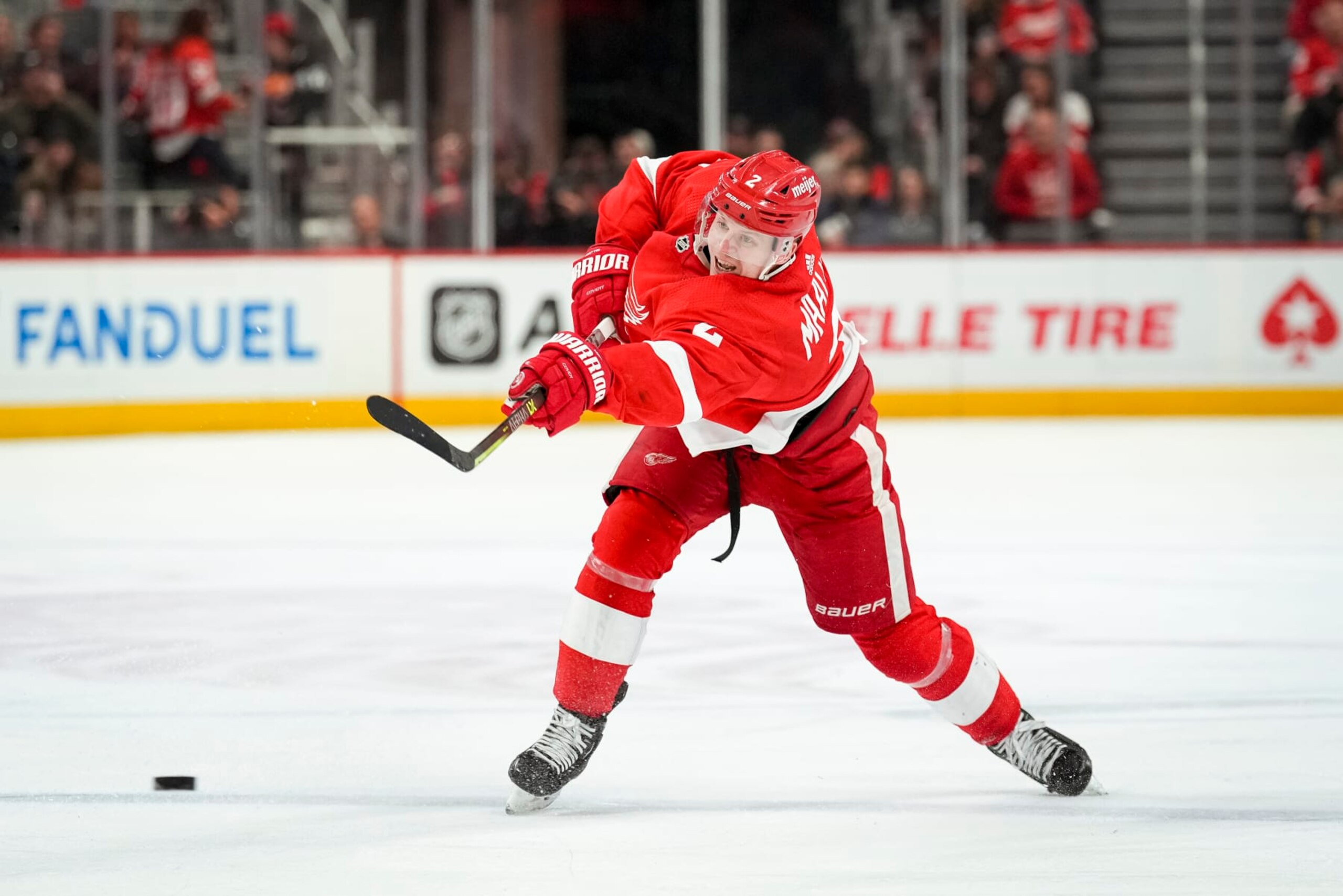 DETROIT, MICHIGAN - JANUARY 14: Olli Maatta #2 of the Detroit Red Wings shoots the puck against the Columbus Blue Jackets during the second period of the game at Little Caesars Arena on January 14, 2023 in Detroit, Michigan. (Photo by Nic Antaya/Getty Images)