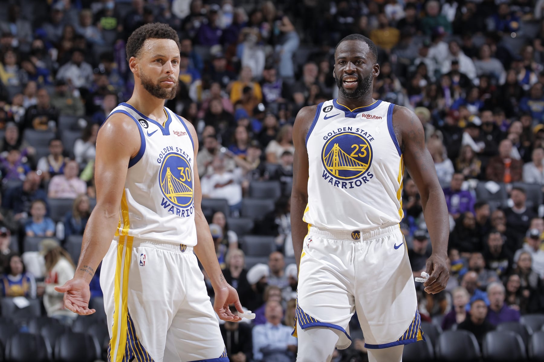 SACRAMENTO, CA - NOVEMBER 13: Stephen Curry #30 and Draymond Green #23 of the Golden State Warriors look on during the game against the the Sacramento Kings on November 13, 2022 at Golden 1 Center in Sacramento, California. NOTE TO USER: User expressly acknowledges and agrees that, by downloading and or using this photograph, User is consenting to the terms and conditions of the Getty Images Agreement. Mandatory Copyright Notice: Copyright 2022 NBAE (Photo by Rocky Widner/NBAE via Getty Images)