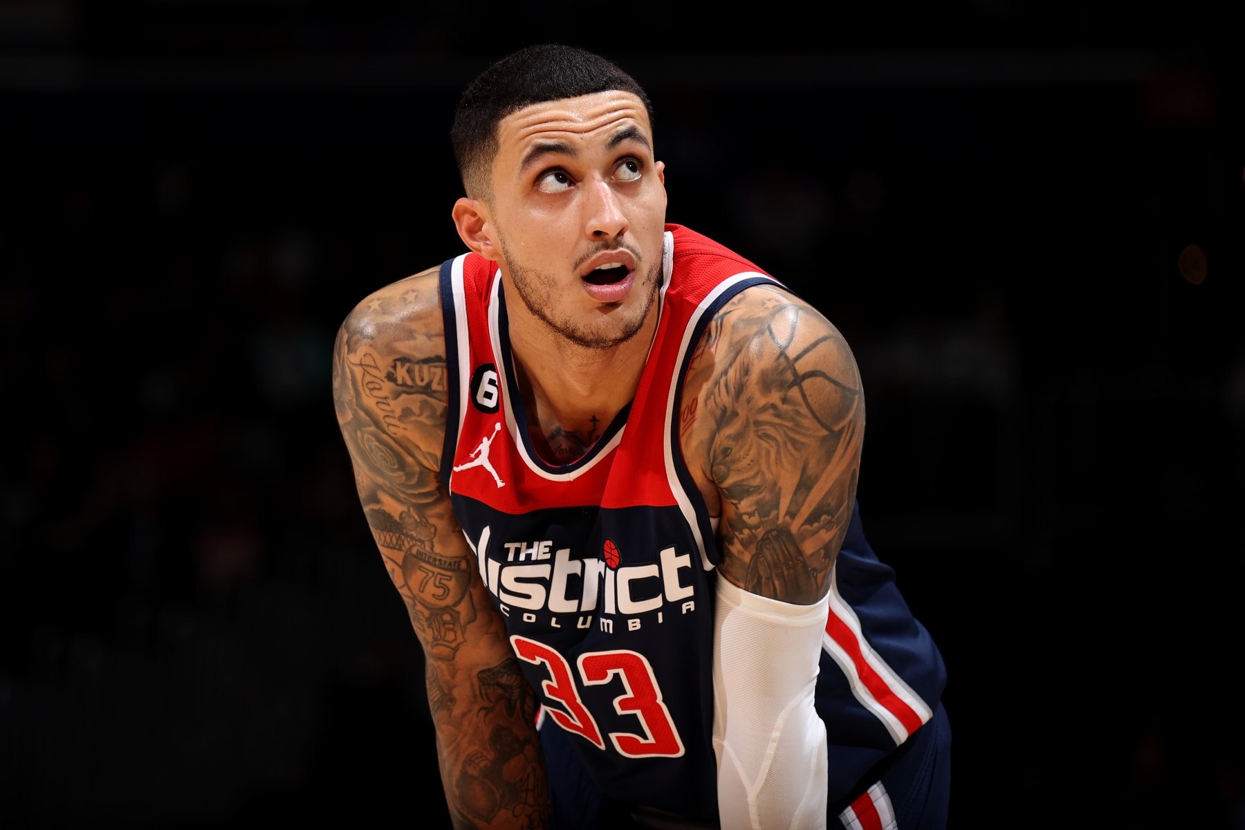 WASHINGTON, DC -  JANUARY 21: Kyle Kuzma #33 of the Washington Wizards looks on during the game against the Orlando Magic  on January 21, 2023 at Capital One Arena in Washington, DC. NOTE TO USER: User expressly acknowledges and agrees that, by downloading and or using this Photograph, user is consenting to the terms and conditions of the Getty Images License Agreement. Mandatory Copyright Notice: Copyright 2023 NBAE (Photo by Stephen Gosling/NBAE via Getty Images)