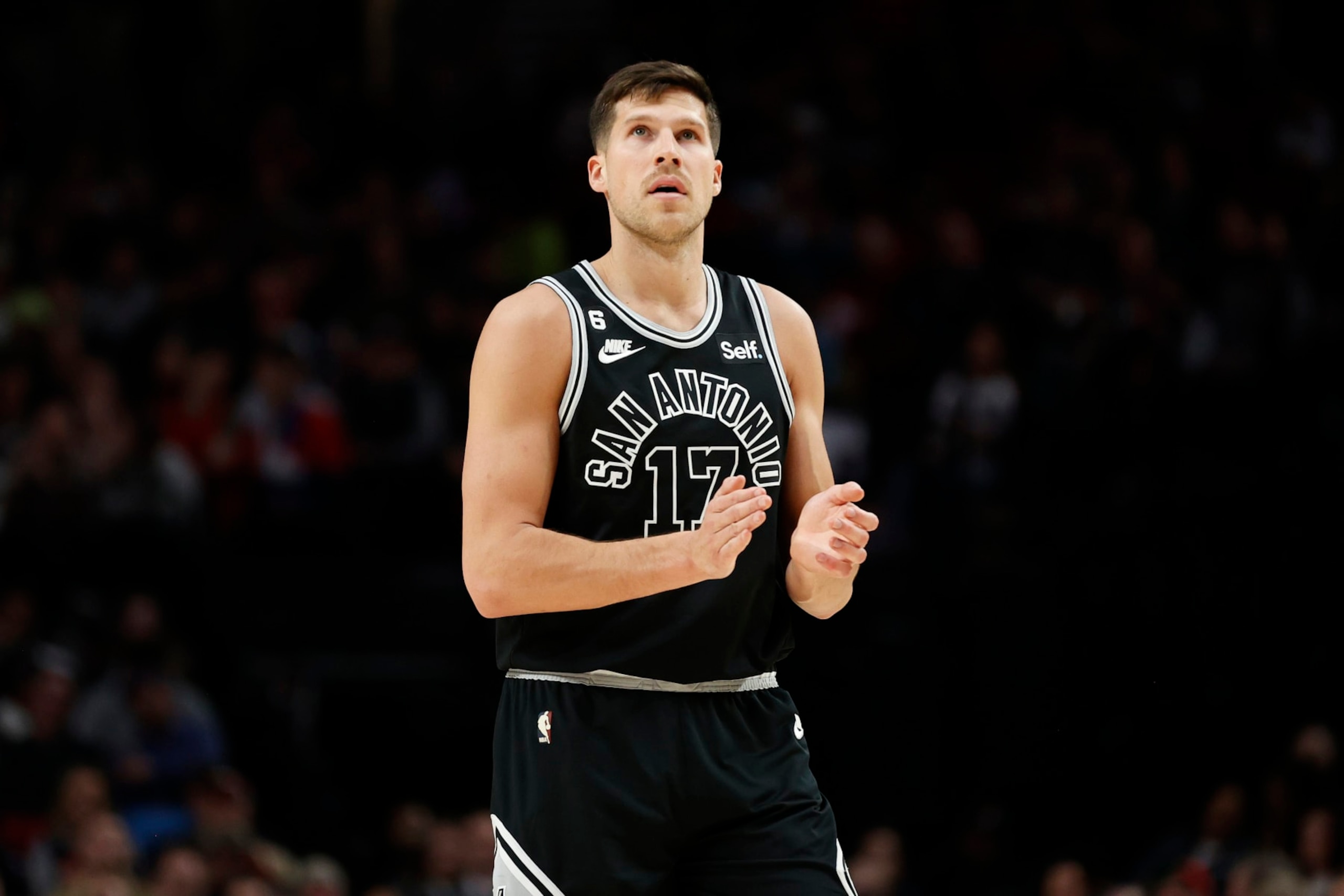 PORTLAND, OREGON - JANUARY 23: Doug McDermott #17 of the San Antonio Spurs reacts during the third quarter against the Portland Trail Blazers at Moda Center on January 23, 2023 in Portland, Oregon. NOTE TO USER: User expressly acknowledges and agrees that, by downloading and/or using this photograph, User is consenting to the terms and conditions of the Getty Images License Agreement. (Photo by Steph Chambers/Getty Images) PORTLAND, OREGON - JANUARY 23: Doug McDermott #17 of the San Antonio Spurs reacts during the third quarter against the Portland Trail Blazers at Moda Center on January 23, 2023 in Portland, Oregon. NOTE TO USER: User expressly acknowledges and agrees that, by downloading and/or using this photograph, User is consenting to the terms and conditions of the Getty Images License Agreement. (Photo by Steph Chambers/Getty Images)