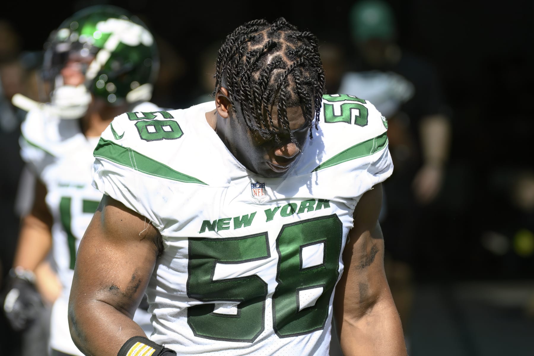 New York Jets defensive lineman Carl Lawson (58) walks onto the field before an NFL football game against the Miami Dolphins, Sunday, Jan. 8, 2023, in Miami Gardens, Fla. (AP Photo/Doug Murray)