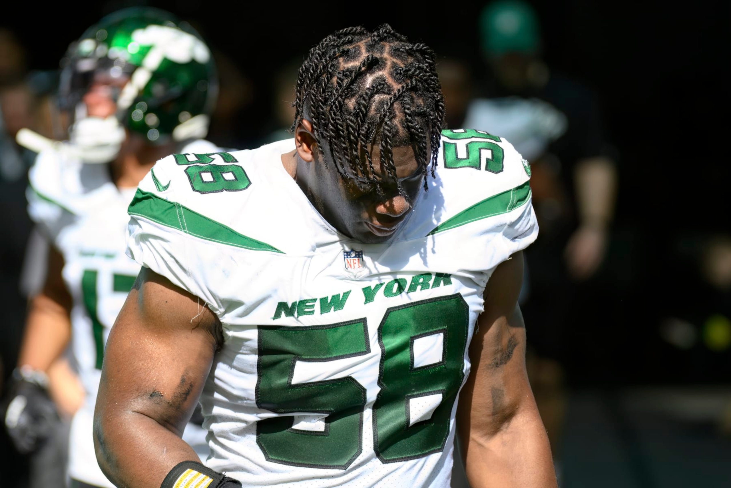 New York Jets defensive lineman Carl Lawson (58) walks onto the field before an NFL football game against the Miami Dolphins, Sunday, Jan. 8, 2023, in Miami Gardens, Fla. (AP Photo/Doug Murray) New York Jets defensive lineman Carl Lawson (58) walks onto the field before an NFL football game against the Miami Dolphins, Sunday, Jan. 8, 2023, in Miami Gardens, Fla. (AP Photo/Doug Murray)