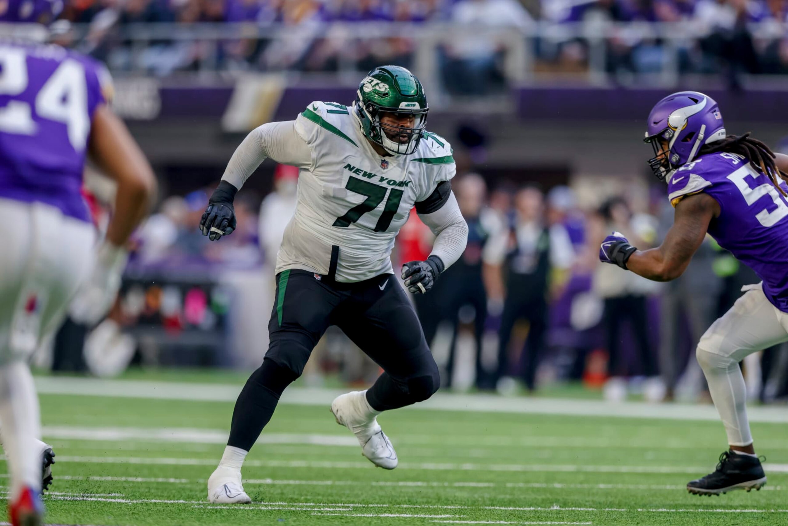 New York Jets offensive tackle Duane Brown (71) in action against the Minnesota Vikings during the second half of an NFL football game Sunday, Dec. 4, 2022 in Minneapolis. (AP Photo/Stacy Bengs) New York Jets offensive tackle Duane Brown (71) in action against the Minnesota Vikings during the second half of an NFL football game Sunday, Dec. 4, 2022 in Minneapolis. (AP Photo/Stacy Bengs)