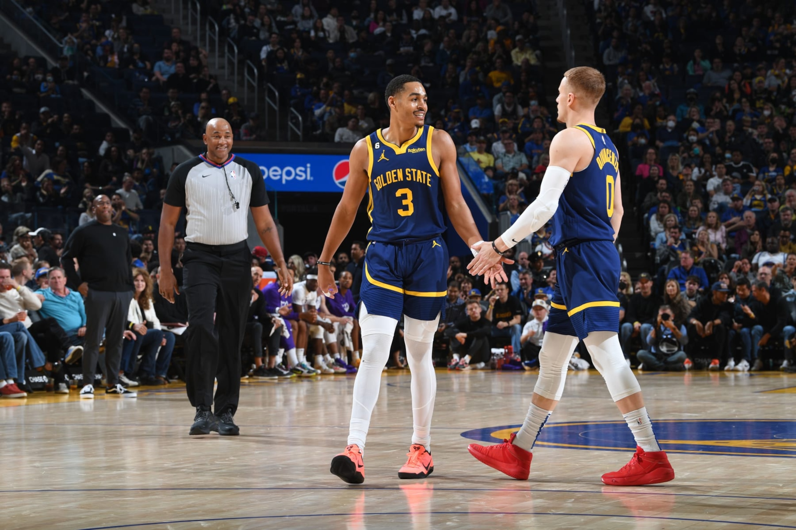 Jordan Poole and Donte DiVincenzo