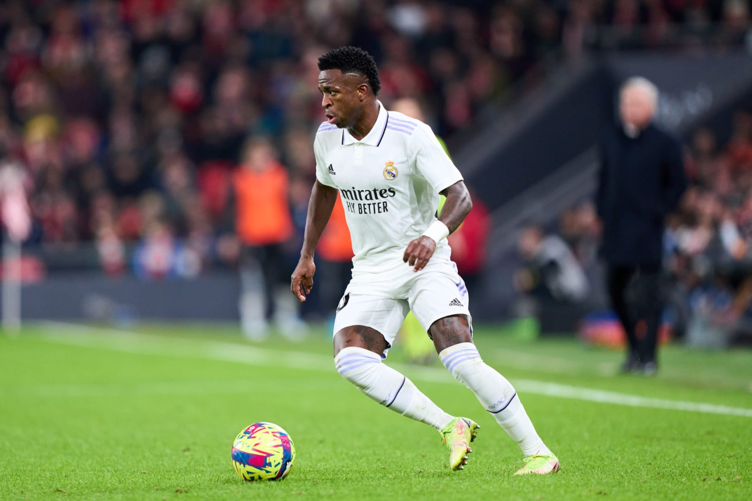 BILBAO, SPAIN - JANUARY 22: Vinicius Junior of Real Madrid in action during the LaLiga Santander match between Athletic Club and Real Madrid CF at San Mames Stadium on January 22, 2023 in Bilbao, Spain. (Photo by Juan Manuel Serrano Arce/Getty Images)