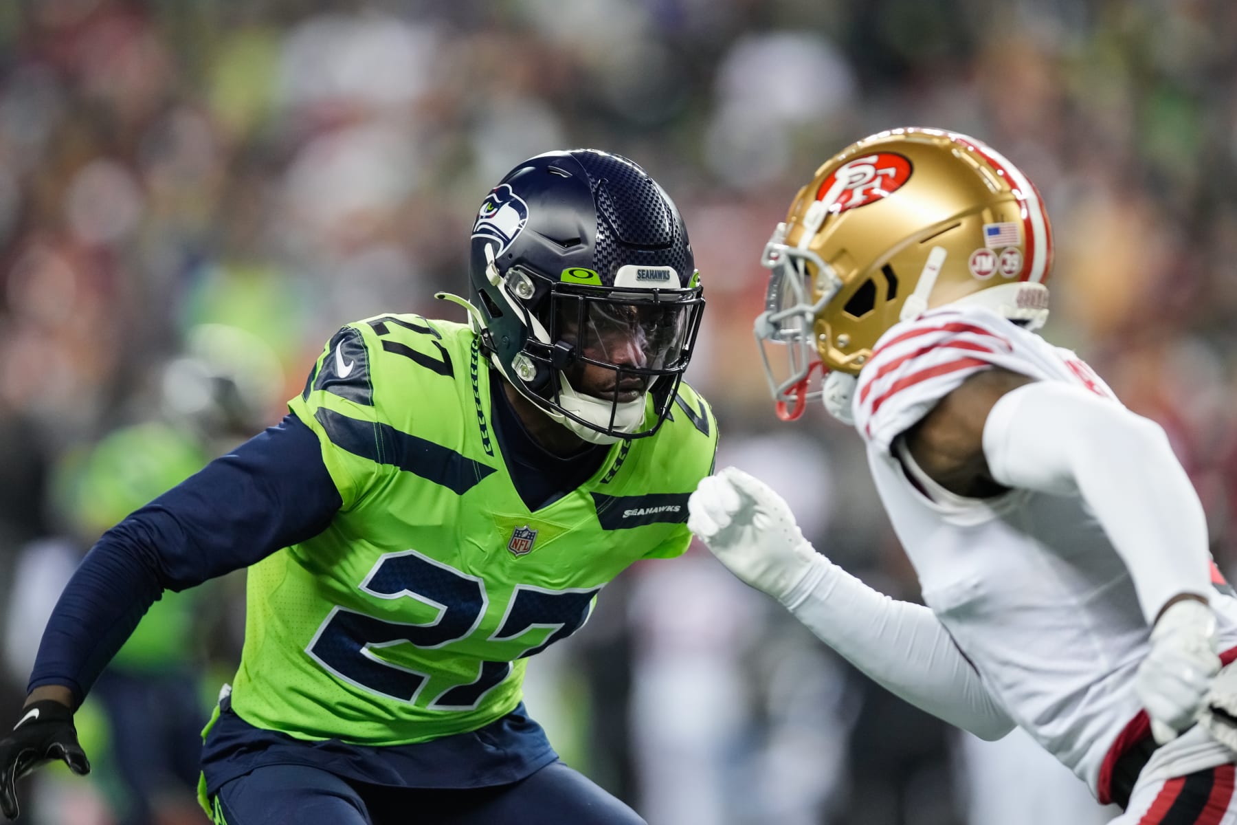 SEATTLE, WASHINGTON - DECEMBER 15: Tariq Woolen #27 of the Seattle Seahawks covers Danny Gray #6 of the San Francisco 49ers during the second quarter of a game at Lumen Field on December 15, 2022 in Seattle, Washington. (Photo by Christopher Mast/Getty Images)