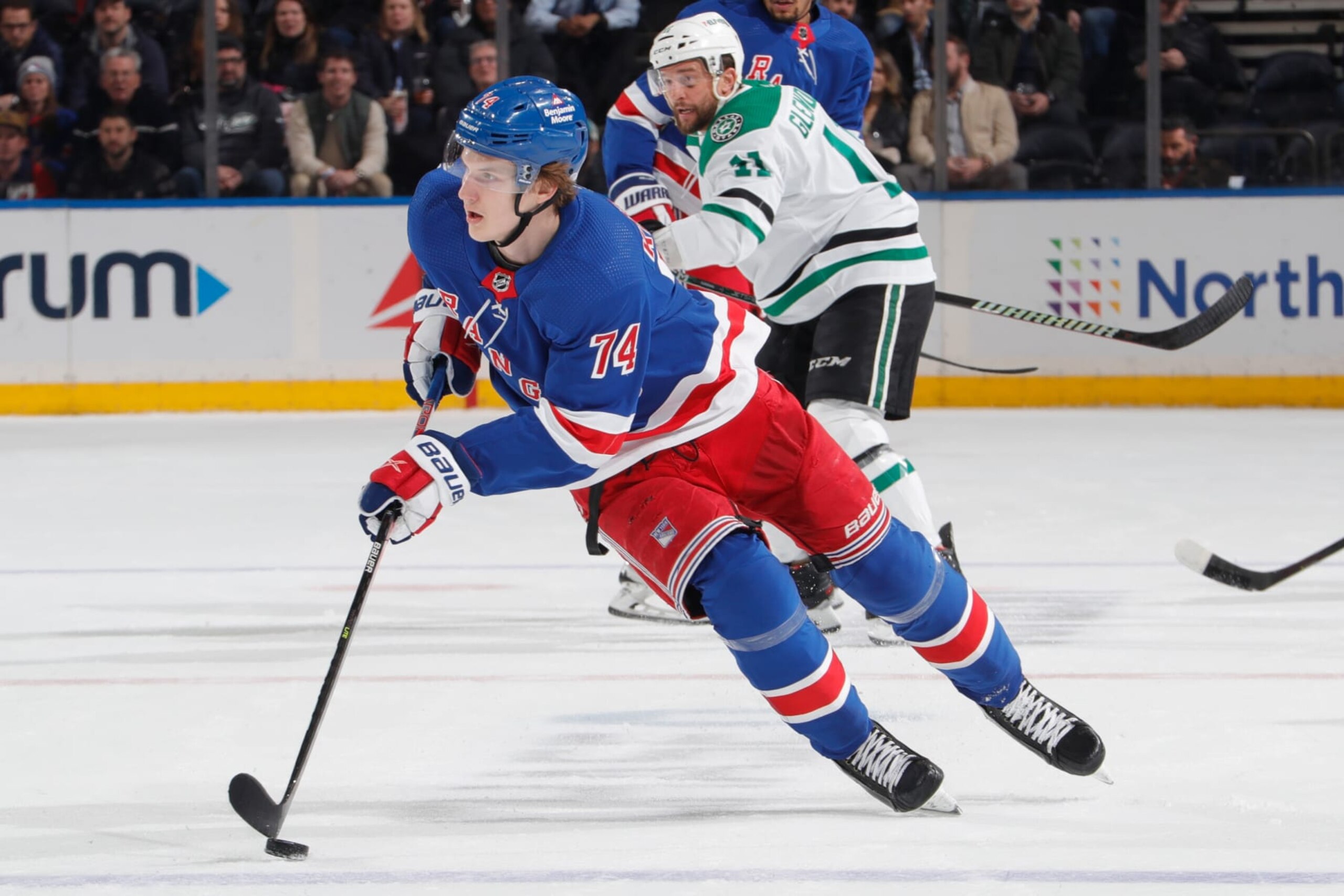NEW YORK, NEW YORK - JANUARY 12:  Vitali Kravtsov #74 of the New York Rangers skates with the puck against the Dallas Stars at Madison Square Garden on January 12, 2023 in New York City. (Photo by Jared Silber/NHLI via Getty Images)