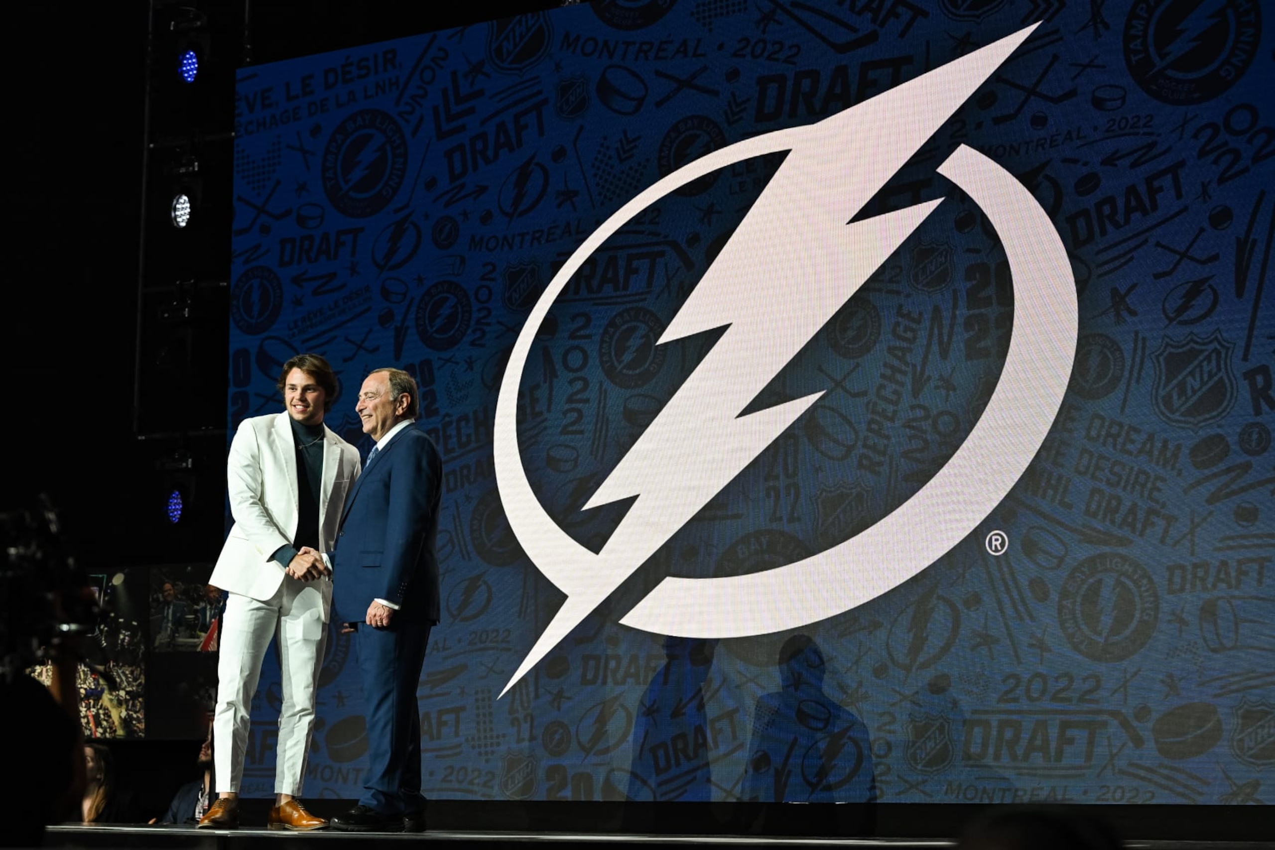 MONTREAL, QC - JULY 07: Tampa Bay Lightning pick Isaac Howard shakes Gary Bettman hand during the first round of the 2022 NHL Entry Draft on July 07, 2022 at Bell Centre in Montreal, QC (Photo by David Kirouac/Icon Sportswire via Getty Images)