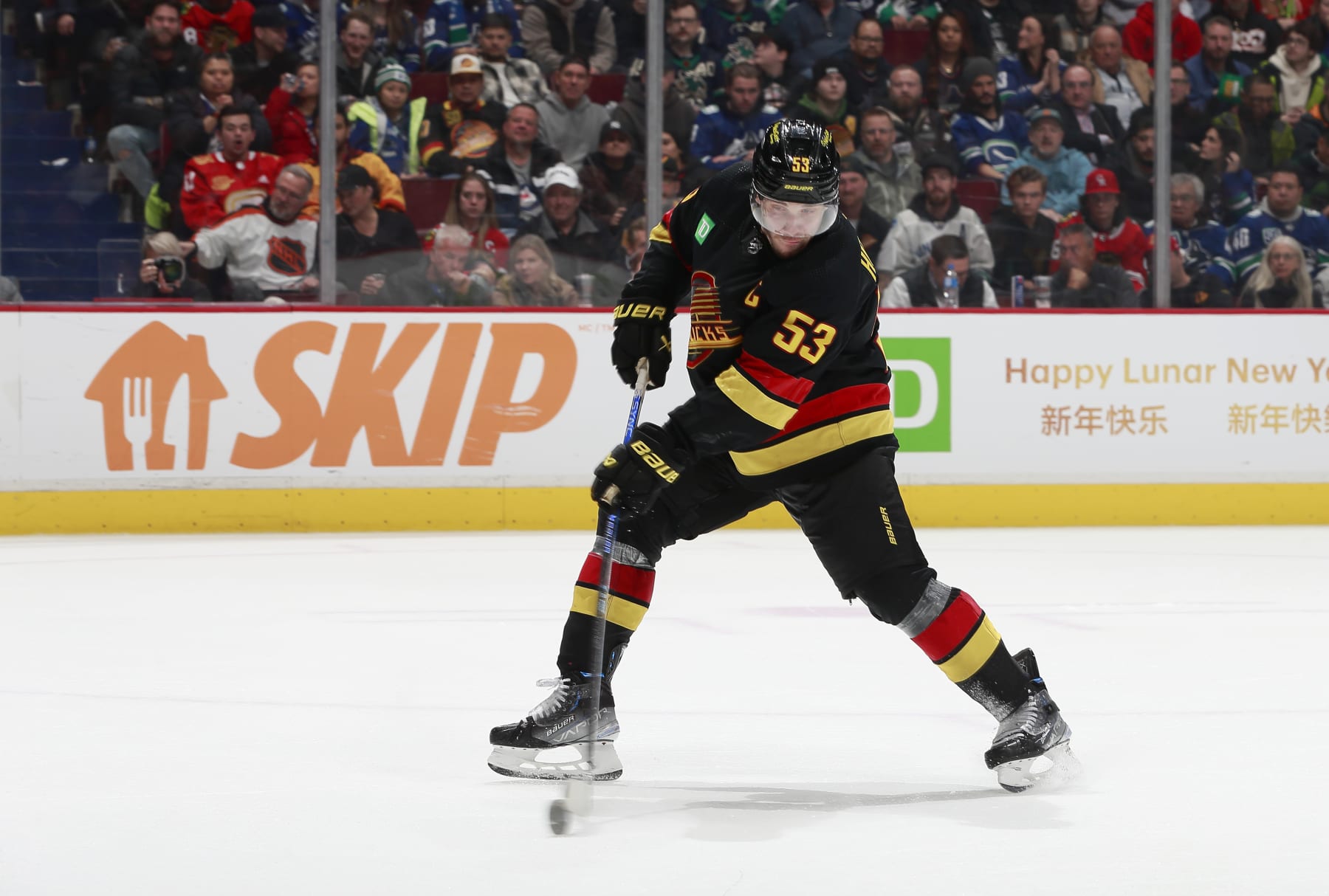 VANCOUVER, CANADA - JANUARY 24: Bo Horvat #53 of the Vancouver Canucks scores goal 5 during the third period of their NHL game at Rogers Arena January 24, 2023 in Vancouver, British Columbia, Canada. The Vancouver Canucks win 5-2.(Photo by Jeff Vinnick/NHLI via Getty Images)