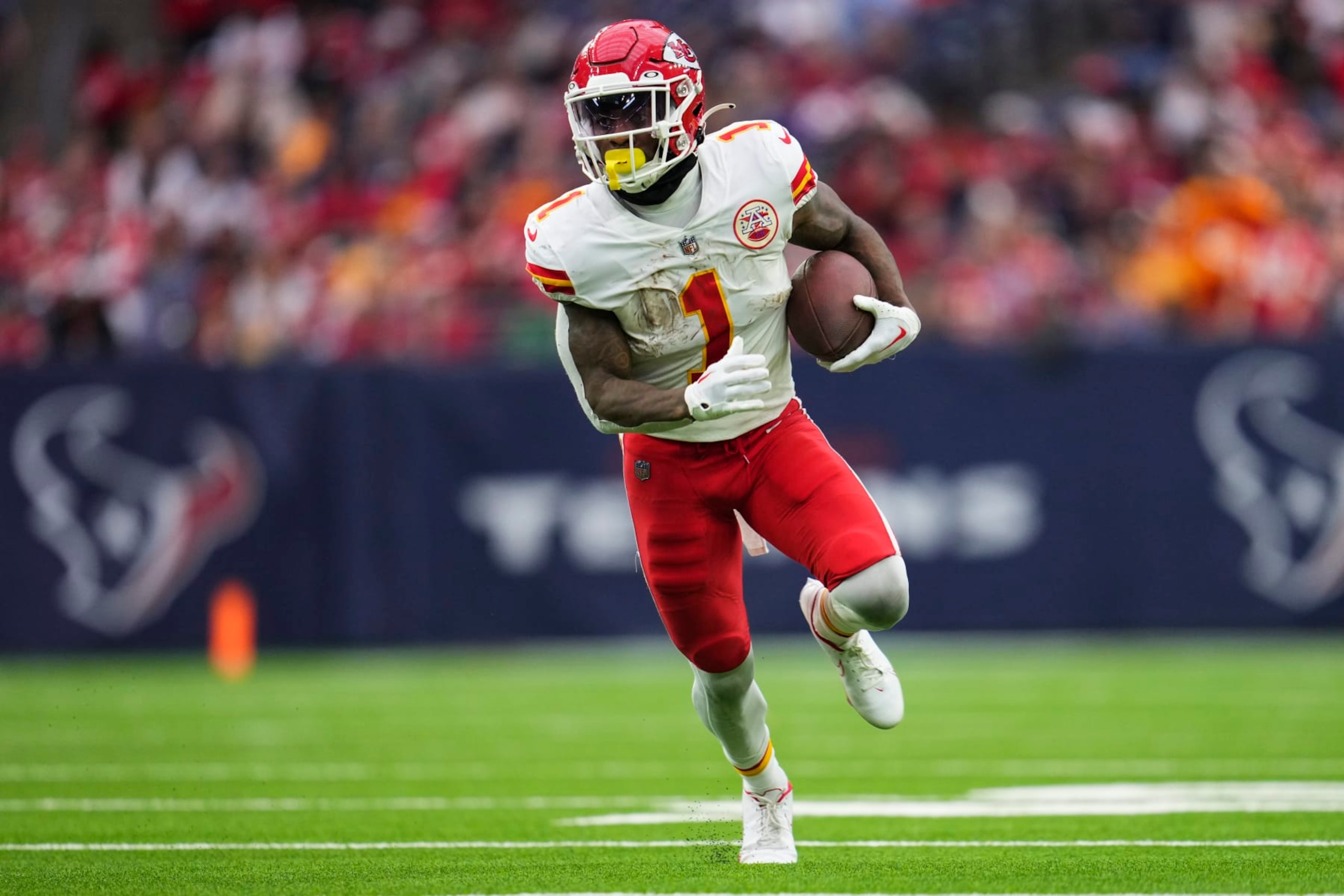 HOUSTON, TX - DECEMBER 18: Jerick McKinnon #1 of the Kansas City Chiefs runs the ball against the Houston Texans at NRG Stadium on December 18, 2022 in Houston, Texas. (Photo by Cooper Neill/Getty Images)