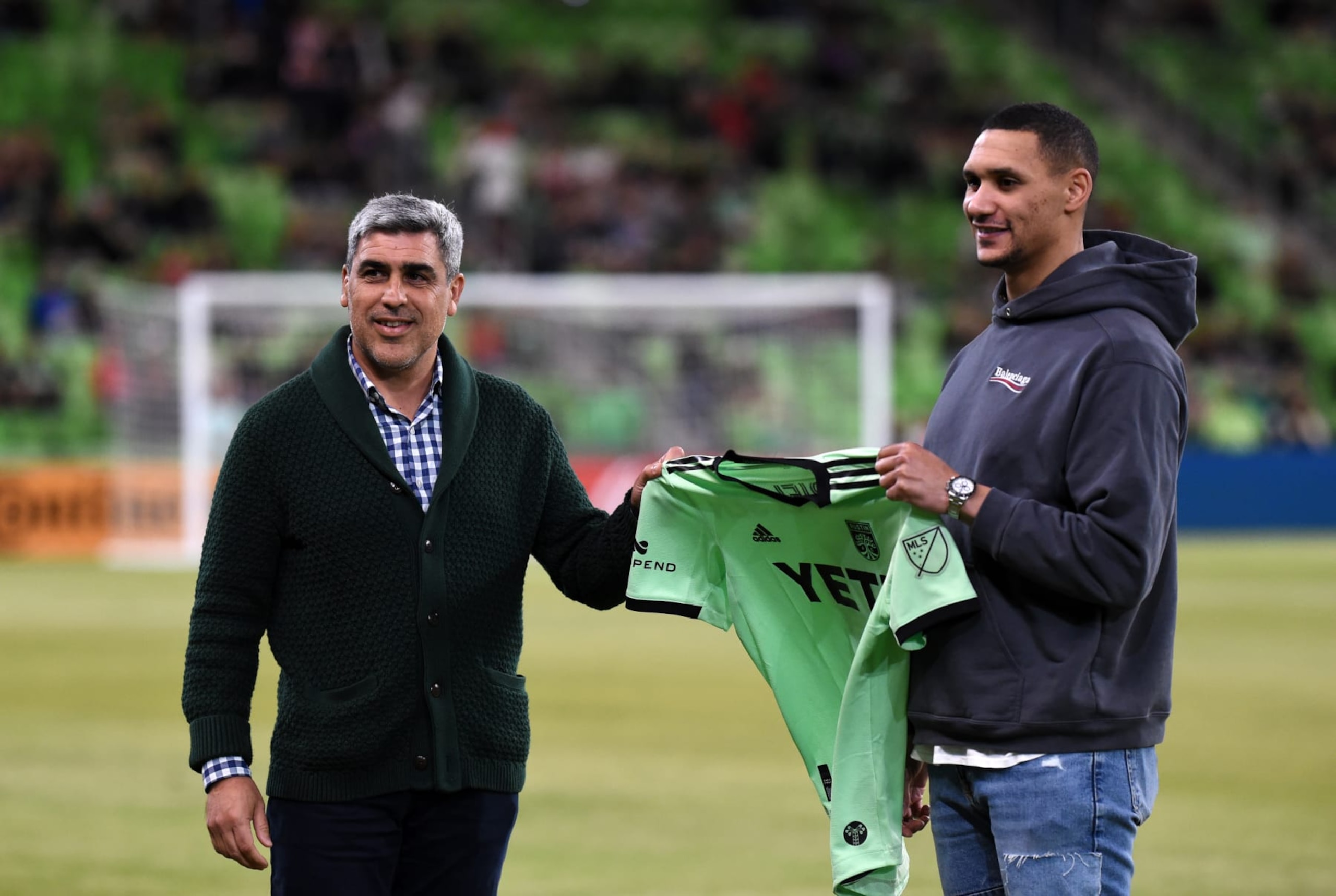 AUSTIN, TX - FEBRUARY 16: Austin FC general manager Claudio Reyna (left) greets newly signed defender Ruben Gabrielson (right) prior to start of game between Atlas and Austin FC on February 16, 2022 at Q2 Stadium in Austin, TX. (Photo by John Rivera/Icon Sportswire via Getty Images)