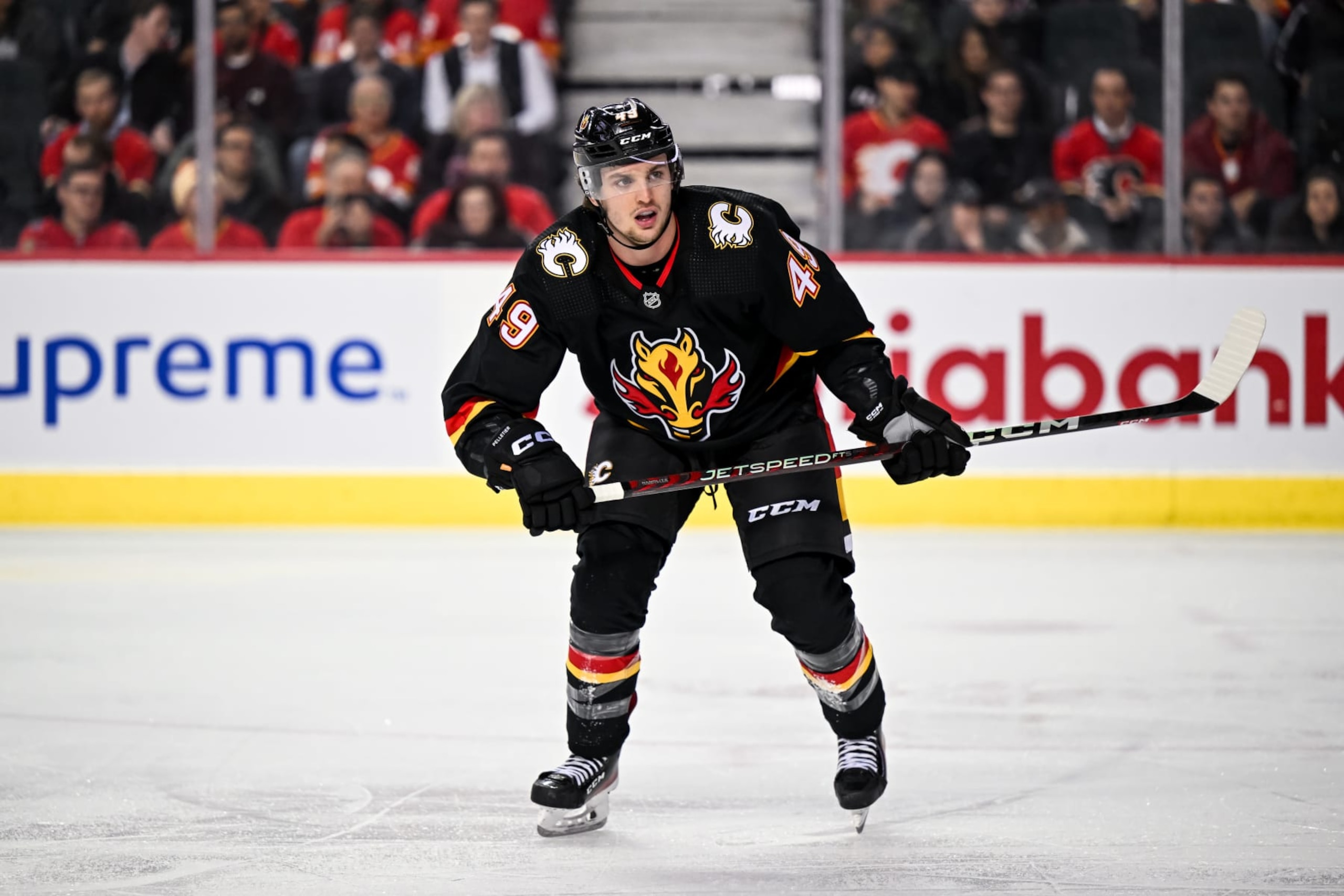 CALGARY, AB - JANUARY 23: Calgary Flames Left Wing Jakob Pelletier (49) in action during the first period of an NHL game between the Calgary Flames and the Columbus Blue Jackets on January 23, 2023, at the Scotiabank Saddledome in Calgary, AB. (Photo by Brett Holmes/Icon Sportswire via Getty Images)