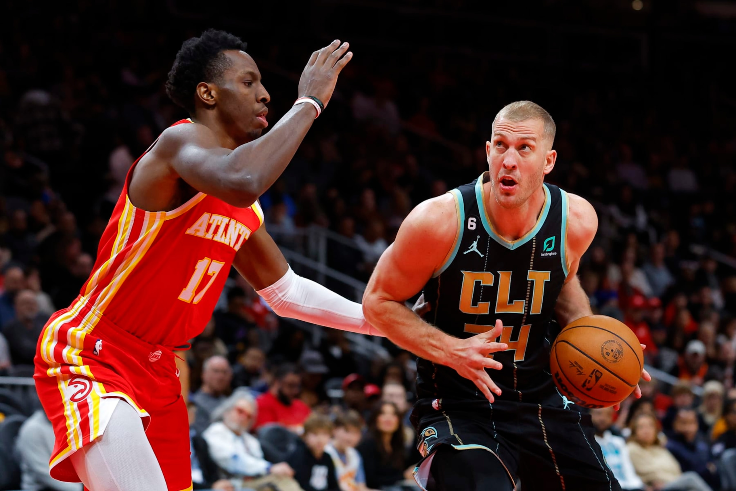 ATLANTA, GA - JANUARY 21: Mason Plumlee #24 of the Charlotte Hornets makes a move against Onyeka Okongwu #17 of the Atlanta Hawks during the first half at State Farm Arena on January 21, 2023 in Atlanta, Georgia. NOTE TO USER: User expressly acknowledges and agrees that, by downloading and or using this photograph, User is consenting to the terms and conditions of the Getty Images License Agreement. (Photo by Todd Kirkland/Getty Images) ATLANTA, GA - JANUARY 21: Mason Plumlee #24 of the Charlotte Hornets makes a move against Onyeka Okongwu #17 of the Atlanta Hawks during the first half at State Farm Arena on January 21, 2023 in Atlanta, Georgia. NOTE TO USER: User expressly acknowledges and agrees that, by downloading and or using this photograph, User is consenting to the terms and conditions of the Getty Images License Agreement. (Photo by Todd Kirkland/Getty Images)