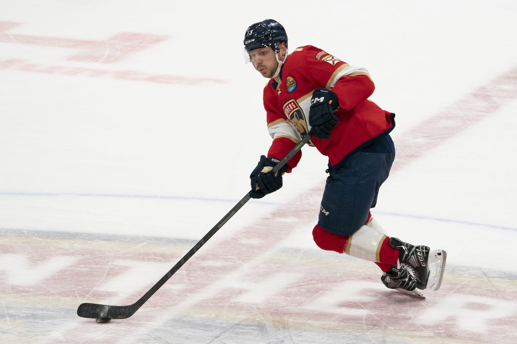 SUNRISE, FL - JANUARY 21: Sam Reinhart #13 of the Florida Panthers skates with the puck during the game between the Florida Panthers and the Minnesota Wild at FLA Live Arean in Sunrise, FL on January 21, 2023. (Photo by Jason Mowry/Icon Sportswire via Getty Images)
