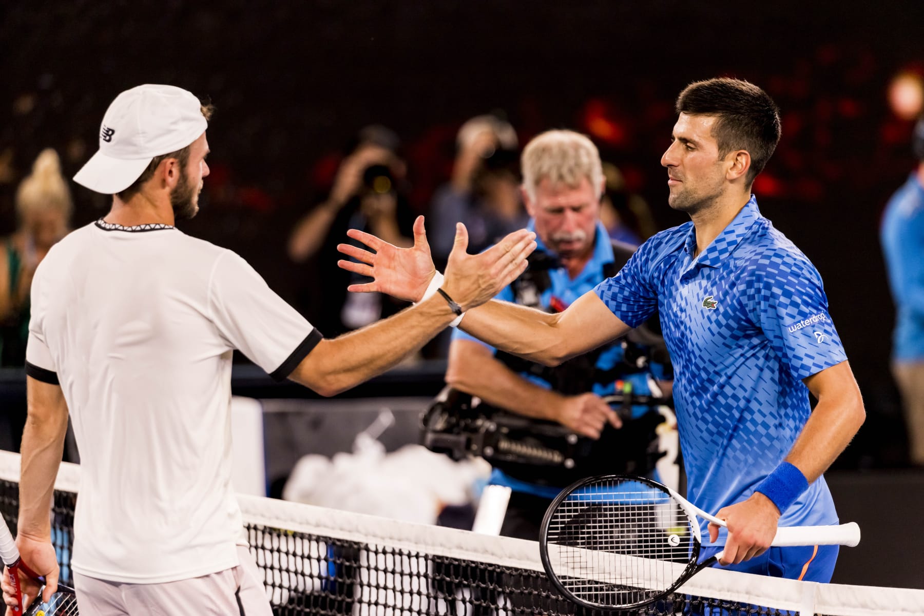 MELBOURNE, VIC - JANUARY 27: Novak Djokovic of Serbia meets his opponent Tommy Paul of the United States of America after winning his Semifinal match of the 2023 Australian Open on January 27 2023, at Melbourne Park in Melbourne, Australia. (Photo by Jason Heidrich/Icon Sportswire via Getty Images)