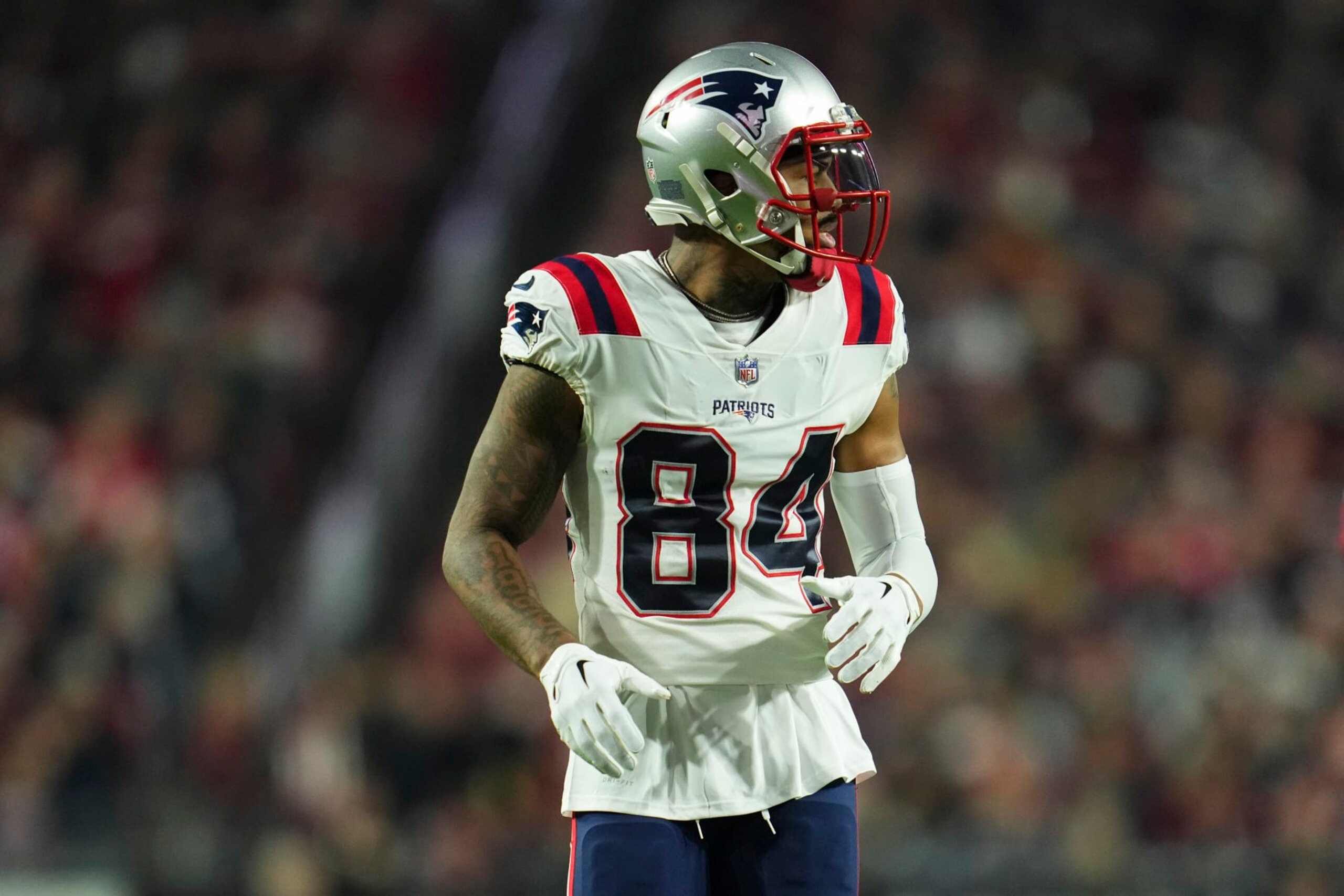 GLENDALE, AZ - DECEMBER 12: Kendrick Bourne #84 of the New England Patriots gets set against the Arizona Cardinals at State Farm Stadium on December 12, 2022 in Glendale, Arizona. (Photo by Cooper Neill/Getty Images)