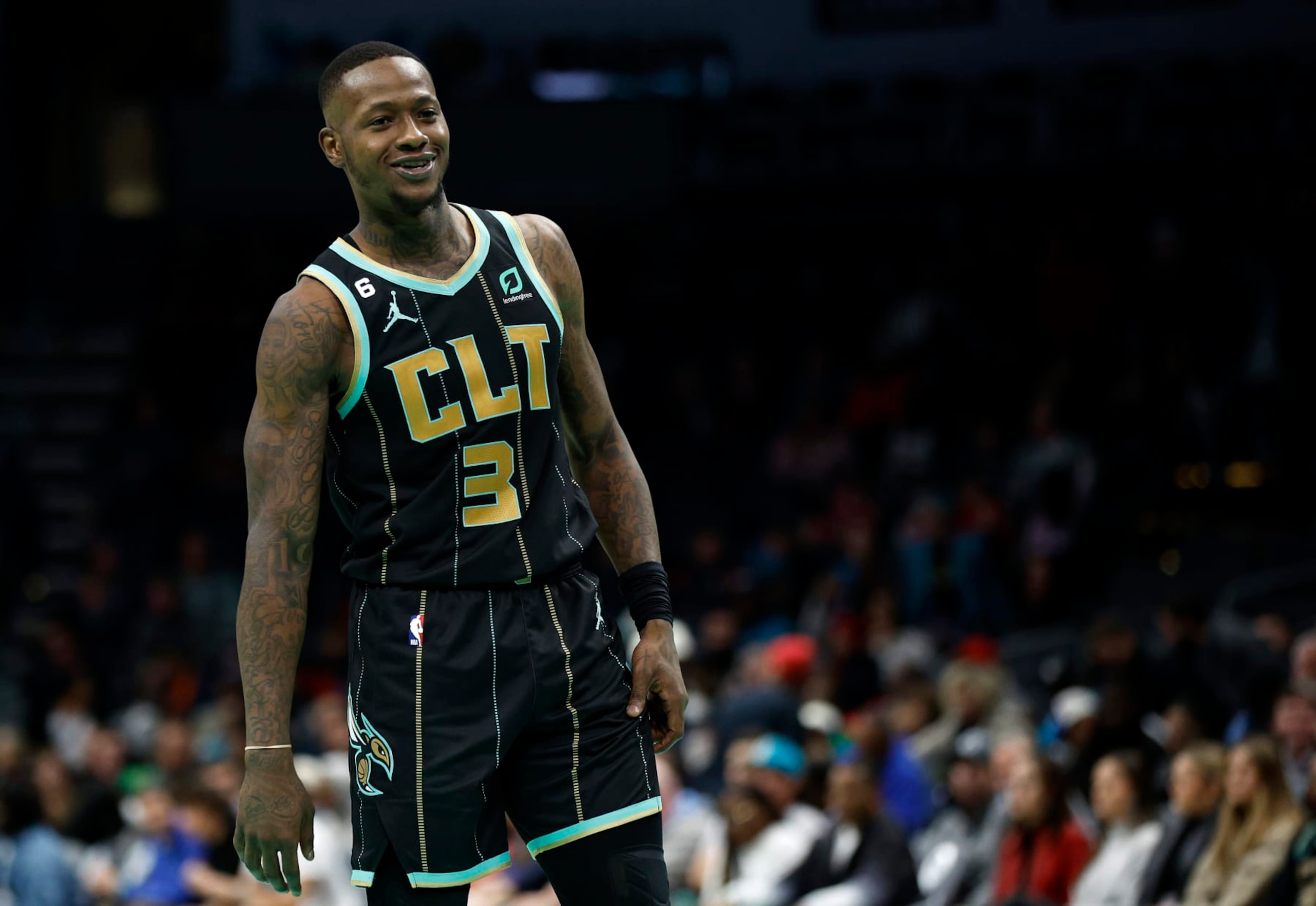 CHARLOTTE, NORTH CAROLINA - JANUARY 26: Terry Rozier #3 of the Charlotte Hornets smiles during the second half of the game against the Chicago Bulls at Spectrum Center on January 26, 2023 in Charlotte, North Carolina. NOTE TO USER: User expressly acknowledges and agrees that, by downloading and or using this photograph, User is consenting to the terms and conditions of the Getty Images License Agreement. (Photo by Jared C. Tilton/Getty Images) CHARLOTTE, NORTH CAROLINA - JANUARY 26: Terry Rozier #3 of the Charlotte Hornets smiles during the second half of the game against the Chicago Bulls at Spectrum Center on January 26, 2023 in Charlotte, North Carolina. NOTE TO USER: User expressly acknowledges and agrees that, by downloading and or using this photograph, User is consenting to the terms and conditions of the Getty Images License Agreement. (Photo by Jared C. Tilton/Getty Images)