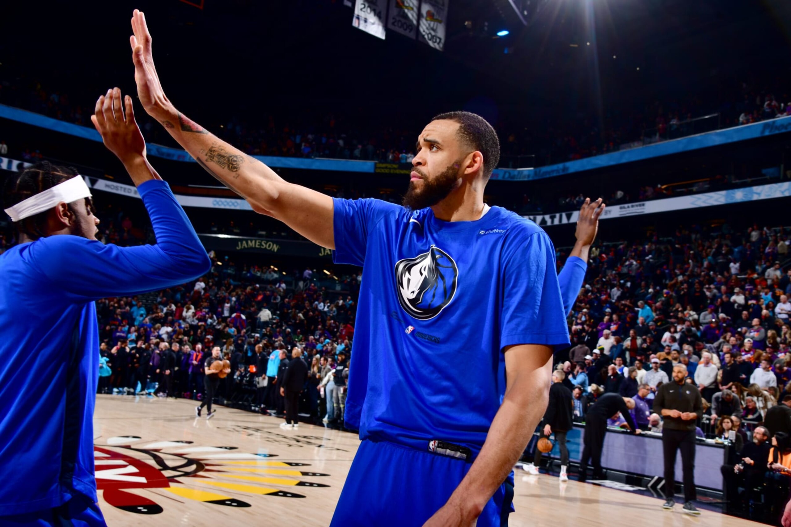 PHOENIX, AZ - JANUARY 26: JaVale McGee #00 of the Dallas Mavericks walks on to the court before the game against the Phoenix Suns on January 26, 2022 at Footprint Center in Phoenix, Arizona. NOTE TO USER: User expressly acknowledges and agrees that, by downloading and or using this photograph, user is consenting to the terms and conditions of the Getty Images License Agreement. Mandatory Copyright Notice: Copyright 2022 NBAE (Photo by Barry Gossage/NBAE via Getty Images) PHOENIX, AZ - JANUARY 26: JaVale McGee #00 of the Dallas Mavericks walks on to the court before the game against the Phoenix Suns on January 26, 2022 at Footprint Center in Phoenix, Arizona. NOTE TO USER: User expressly acknowledges and agrees that, by downloading and or using this photograph, user is consenting to the terms and conditions of the Getty Images License Agreement. Mandatory Copyright Notice: Copyright 2022 NBAE (Photo by Barry Gossage/NBAE via Getty Images)