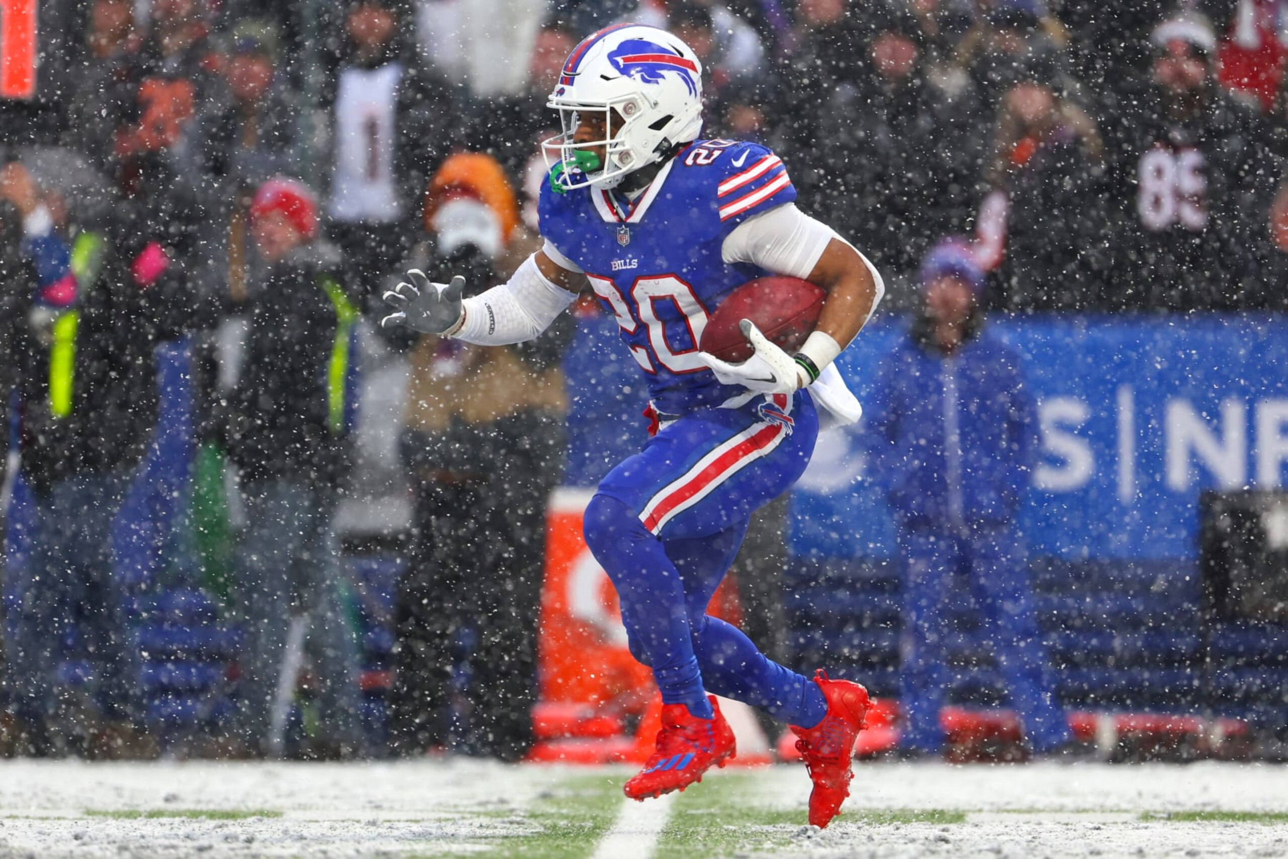 ORCHARD PARK, NEW YORK - JANUARY 22: Nyheim Hines #20 of the Buffalo Bills returns a kick against the Cincinnati Bengals during the second quarter in the AFC Divisional Playoff game at Highmark Stadium on January 22, 2023 in Orchard Park, New York. (Photo by Timothy T Ludwig/Getty Images)