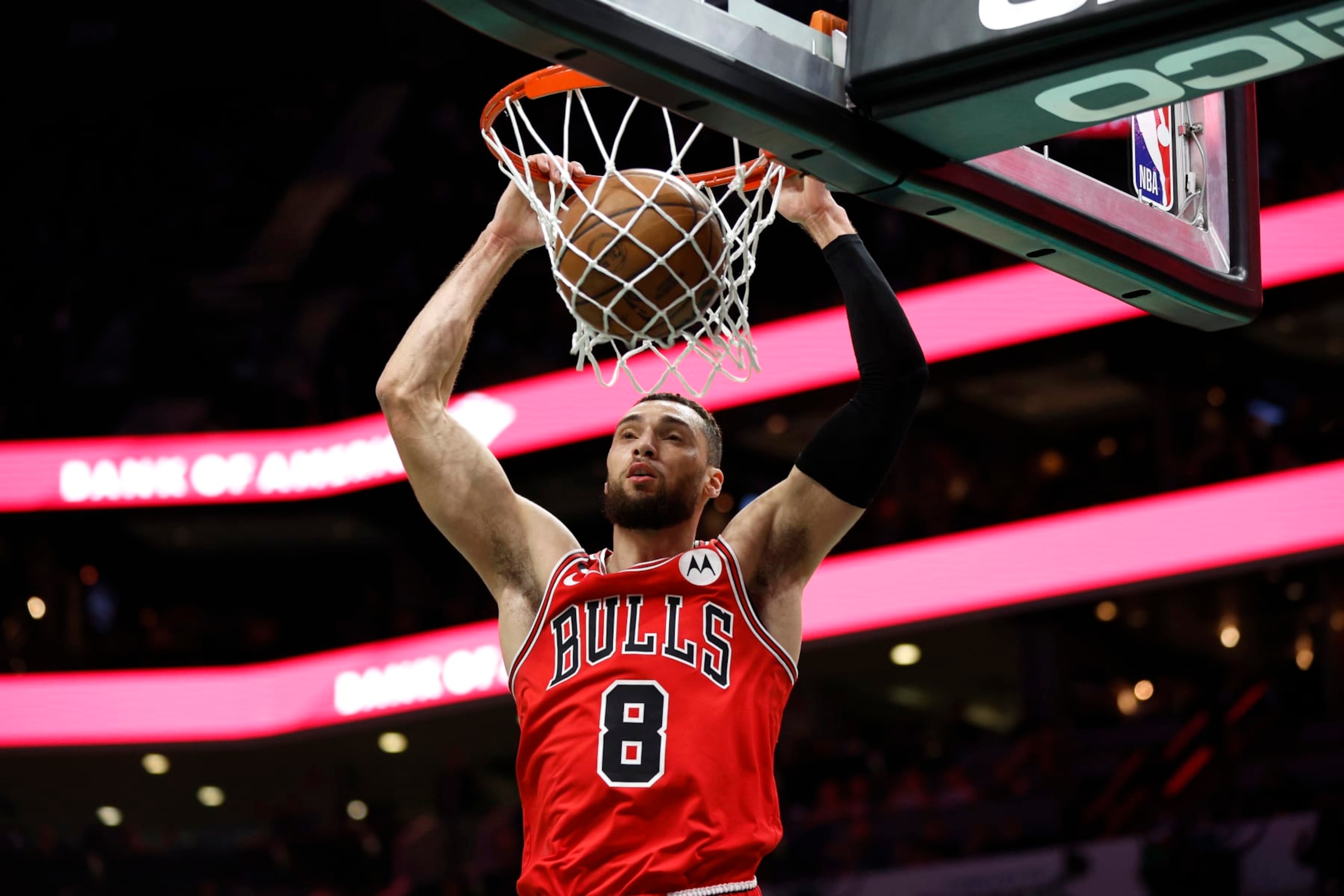 CHARLOTTE, NORTH CAROLINA - JANUARY 26: Zach LaVine #8 of the Chicago Bulls dunks the ball during the first quarter of the game against the Charlotte Hornets at Spectrum Center on January 26, 2023 in Charlotte, North Carolina. NOTE TO USER: User expressly acknowledges and agrees that, by downloading and or using this photograph, User is consenting to the terms and conditions of the Getty Images License Agreement.  (Photo by Jared C. Tilton/Getty Images)