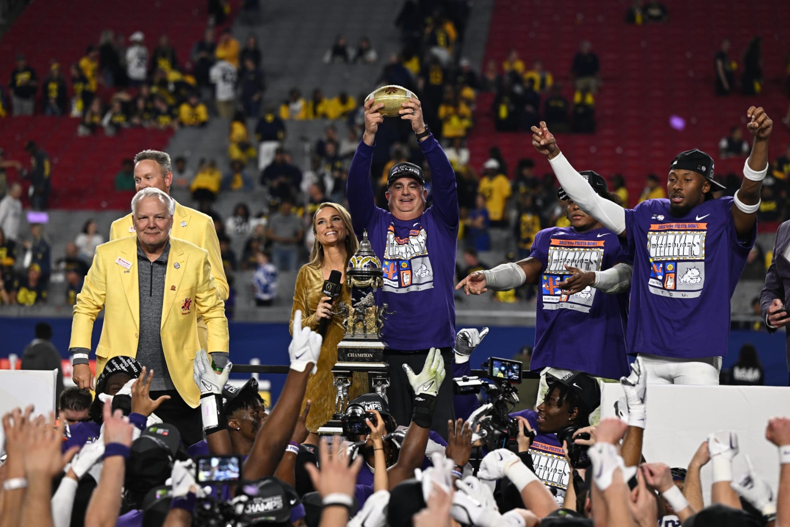 College Football: Fiesta Bowl: TCU head coach Sonny Dykes hoists the Fiesta Bowl trophy vs Michigan at State Farm Stadium. Glendale, AZ 12/31/2022 CREDIT: John W. McDonough (Photo by John W. McDonough /Sports Illustrated via Getty Images) (Set Number: X164269 TK1)