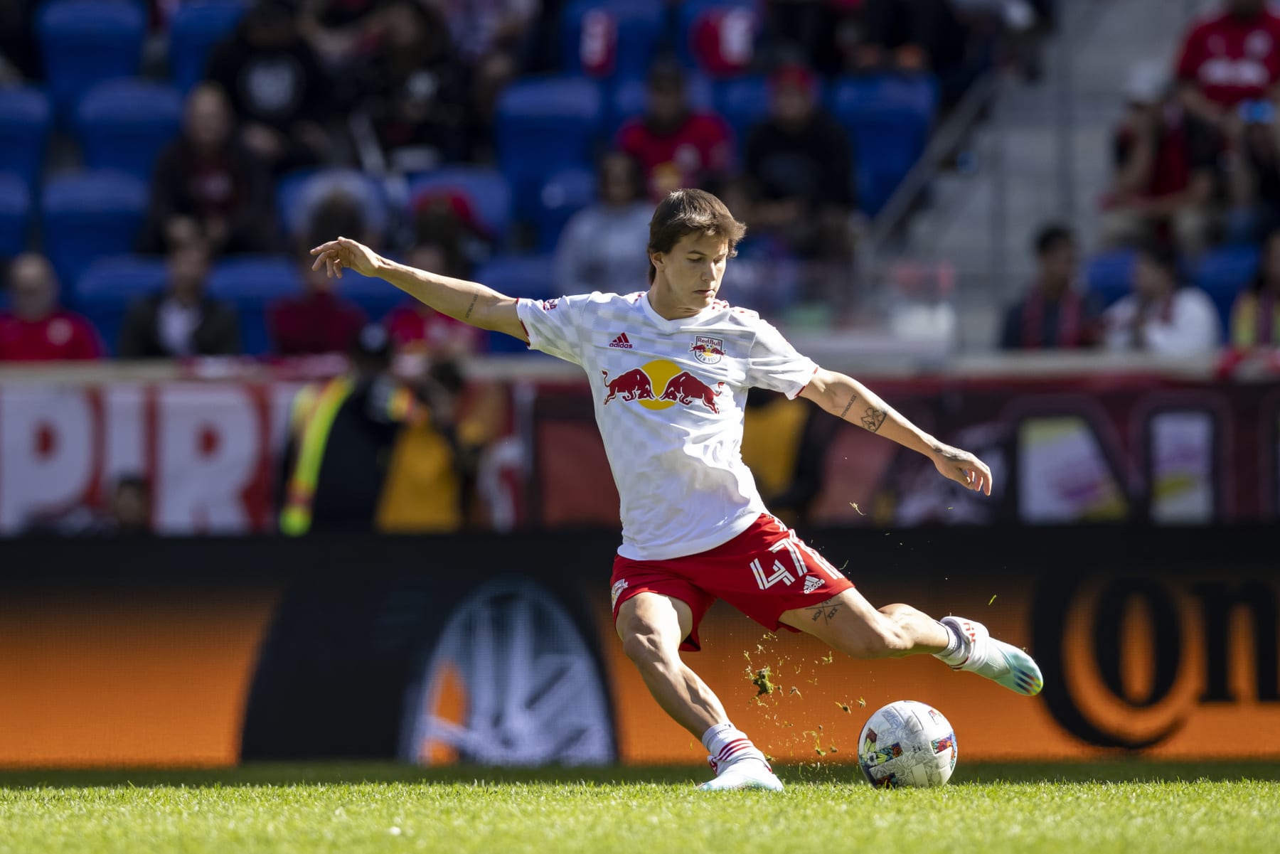 HARRISON, NJ - OCTOBER 15: John Tolkin #47 of New York Red Bulls passes the ball in the second half of the Eastern Conference Round One match in the Audi 2022 MLS Cup Playoff against FC Cincinnati at Red Bull Arena on October 15, 2022 in Harrison, New Jersey. (Photo by Ira L. Black - Corbis/Getty Images)