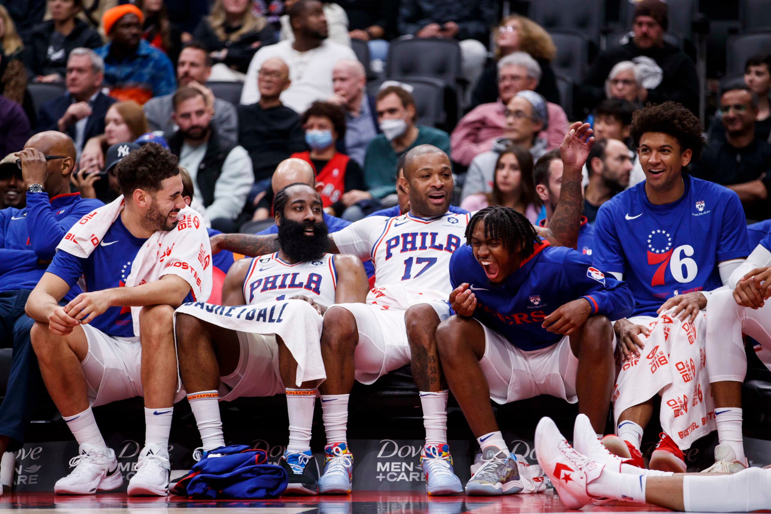 TORONTO, ON - OCTOBER 28: Tyrese Maxey #0 of the Philadelphia 76ers laughs on the bench alongside Georges Niang #20, James Harden #1, P.J. Tucker #17, and Matisse Thybulle #22 during the second half of the game against the Toronto Raptors at Scotiabank Arena on October 28, 2022 in Toronto, Canada. NOTE TO USER: User expressly acknowledges and agrees that, by downloading and or using this photograph, User is consenting to the terms and conditions of the Getty Images License Agreement. (Photo by Cole Burston/Getty Images