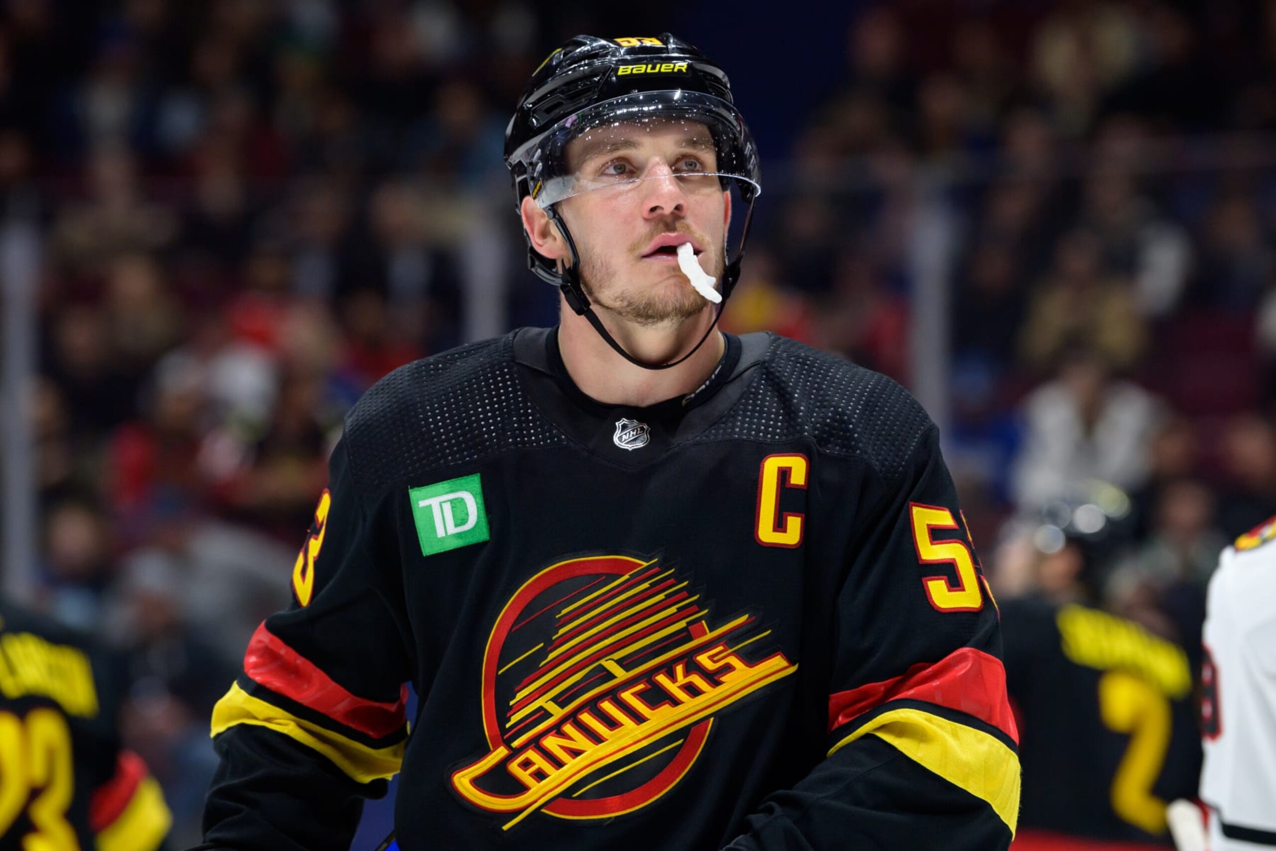 VANCOUVER, CANADA - JANUARY 24: Bo Horvat #53 of the Vancouver Canucks waits for a face-off during the third period of their NHL game against the Chicago Blackhawks at Rogers Arena on January 24, 2023 in Vancouver, British Columbia, Canada. Vancouver won 5-2. (Photo by Derek Cain/Getty Images)