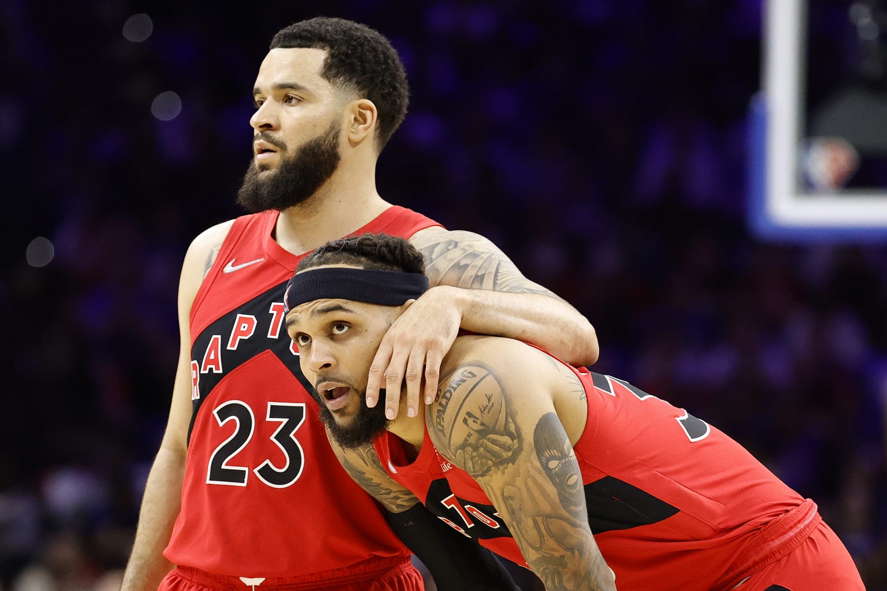 PHILADELPHIA, PENNSYLVANIA - APRIL 16: Fred VanVleet #23 and Gary Trent Jr. #33 of the Toronto Raptors look on during the third quarter against the Philadelphia 76ers during Game One of the Eastern Conference First Round at Wells Fargo Center on April 16, 2022 in Philadelphia, Pennsylvania. NOTE TO USER: User expressly acknowledges and agrees that, by downloading and or using this photograph, User is consenting to the terms and conditions of the Getty Images License Agreement. (Photo by Tim Nwachukwu/Getty Images)