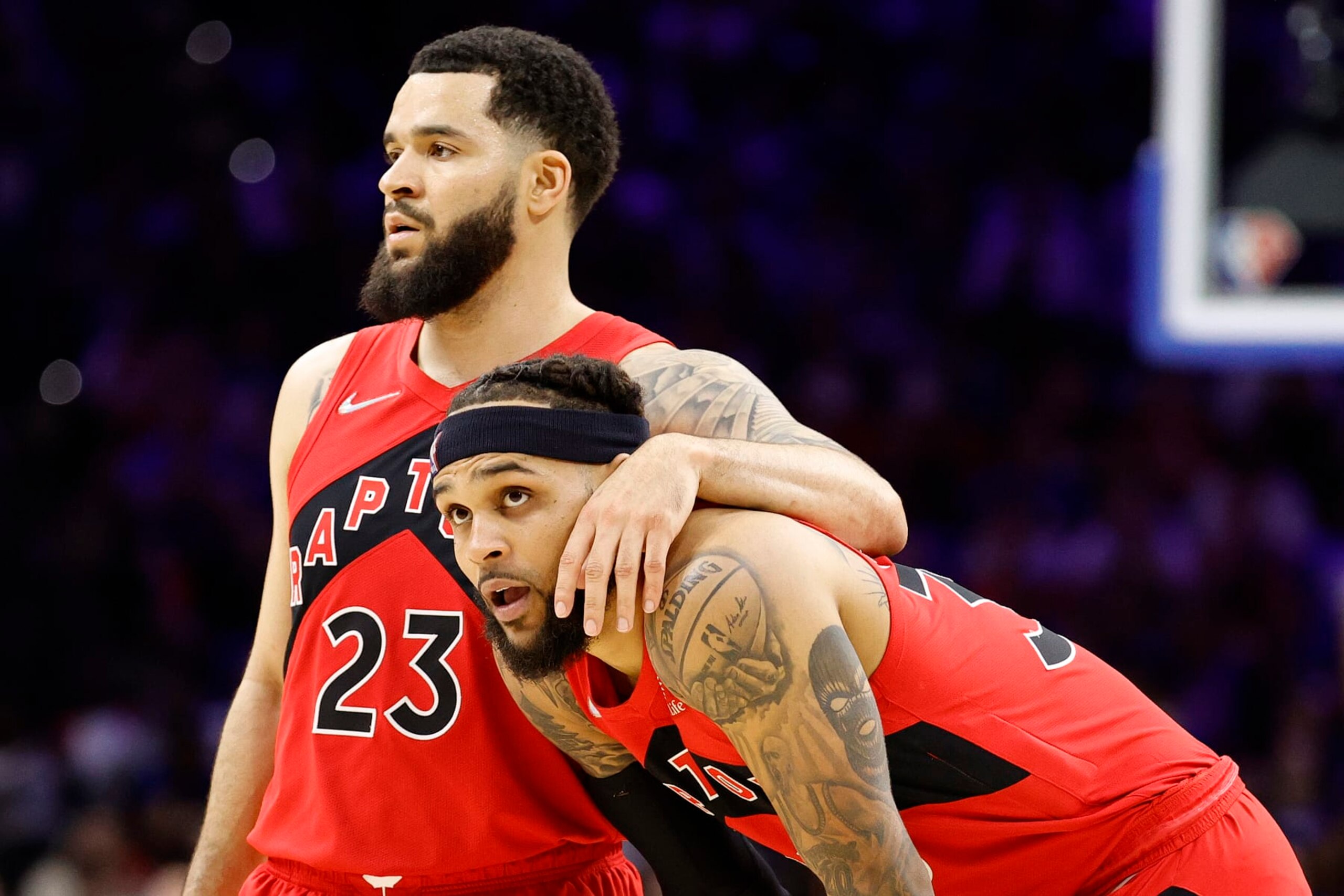 PHILADELPHIA, PENNSYLVANIA - APRIL 16: Fred VanVleet #23 and Gary Trent Jr. #33 of the Toronto Raptors look on during the third quarter against the Philadelphia 76ers during Game One of the Eastern Conference First Round at Wells Fargo Center on April 16, 2022 in Philadelphia, Pennsylvania. NOTE TO USER: User expressly acknowledges and agrees that, by downloading and or using this photograph, User is consenting to the terms and conditions of the Getty Images License Agreement. (Photo by Tim Nwachukwu/Getty Images)