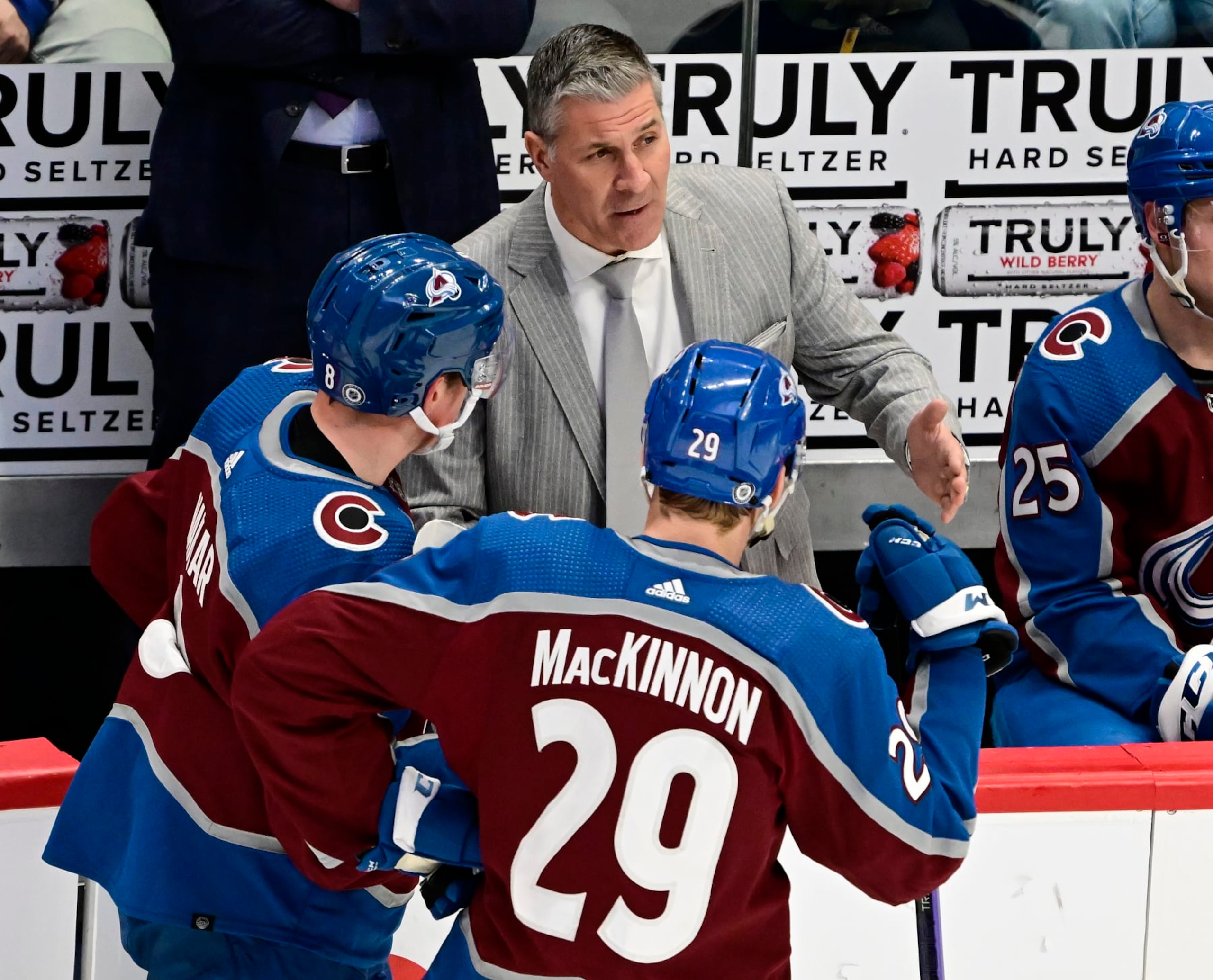DENVER, CO - JANUARY 26: Colorado Avalanche head coach Jared Bednar talks with Colorado Avalanche defenseman Cale Makar (8) and Colorado Avalanche center Nathan MacKinnon (29) during a time out in the second period against the Anaheim Ducks at Ball Arena January 26, 2023. (Photo by Andy Cross/MediaNews Group/The Denver Post via Getty Images)