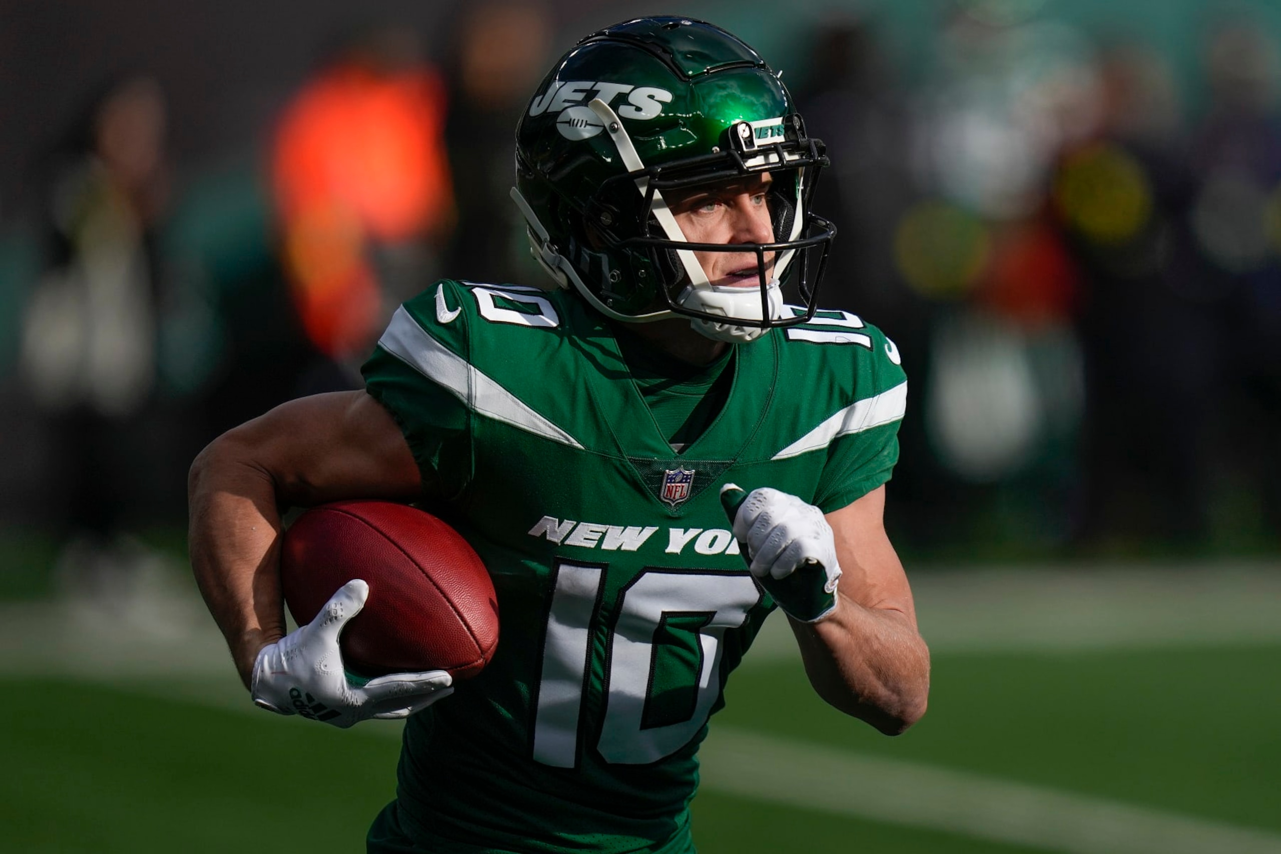 New York Jets wide receiver Braxton Berrios (10) carries the ball against the Detroit Lions during the first quarter of an NFL football game, Sunday, Dec. 18, 2022, in East Rutherford, N.J. (AP Photo/Seth Wenig) New York Jets wide receiver Braxton Berrios (10) carries the ball against the Detroit Lions during the first quarter of an NFL football game, Sunday, Dec. 18, 2022, in East Rutherford, N.J. (AP Photo/Seth Wenig)