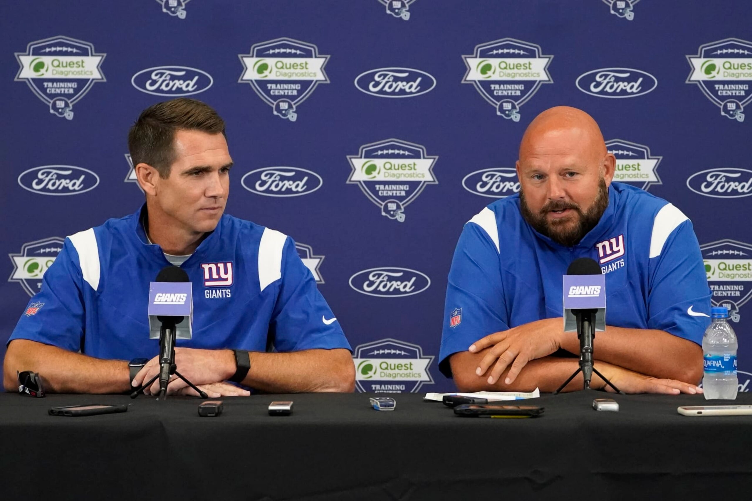 New York Giants general manager Joe Schoen, left, and head coach Brian Daboll, right, attend a news conference before training camp at the NFL football team's practice facility, Wednesday, July 27, 2022, in East Rutherford, N.J. (AP Photo/John Minchillo)