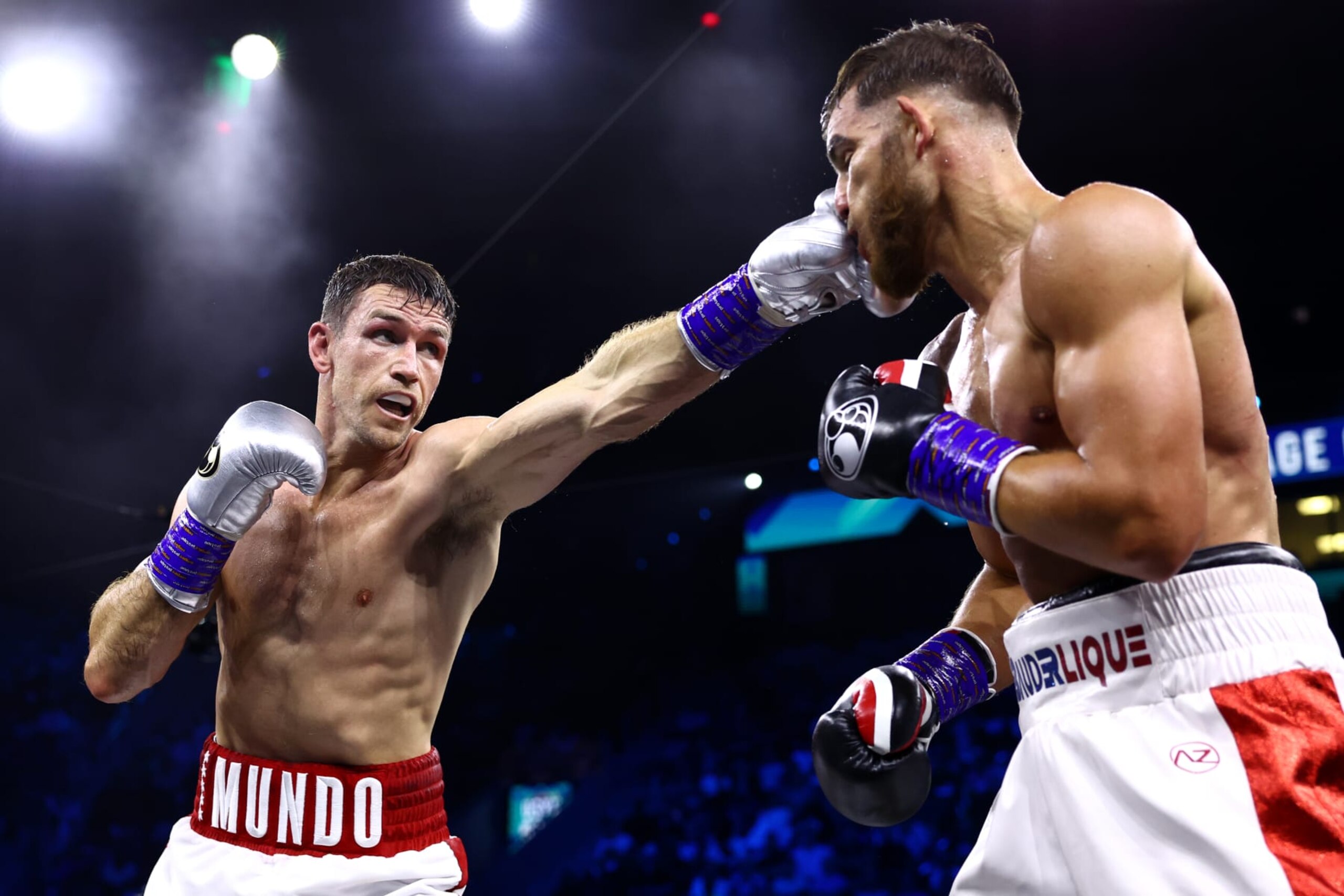 JEDDAH, SAUDI ARABIA - AUGUST 20: Callum Smith punches Mathieu Bauderlique in the Final Eliminator for the WBC Super-Middleweight Title fight during the Rage on the Red Sea Heavyweight Title Fight at King Abdullah Sports City Arena on August 20, 2022 in Jeddah, Saudi Arabia. (Photo by Francois Nel/Getty Images)