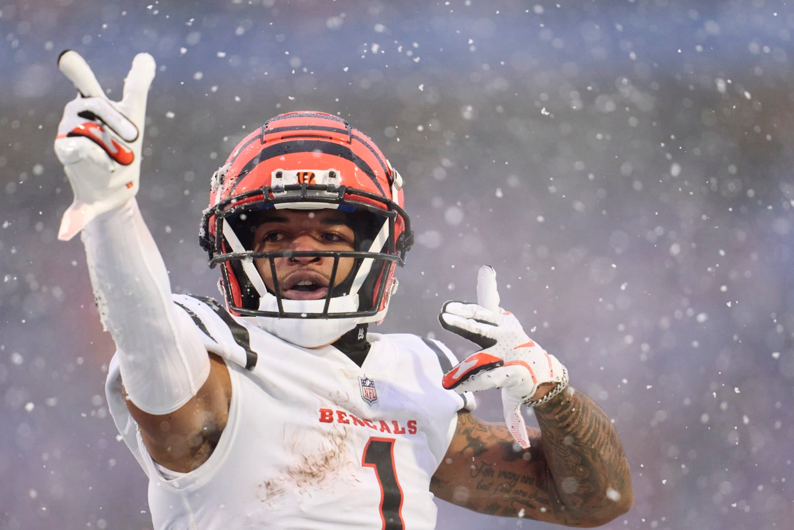 ORCHARD PARK, NY - JANUARY 22: Ja'Marr Chase #1 of the Cincinnati Bengals celebrates after a play against the Buffalo Bills during the first half at Highmark Stadium on January 22, 2023 in Orchard Park, New York. (Photo by Cooper Neill/Getty Images)