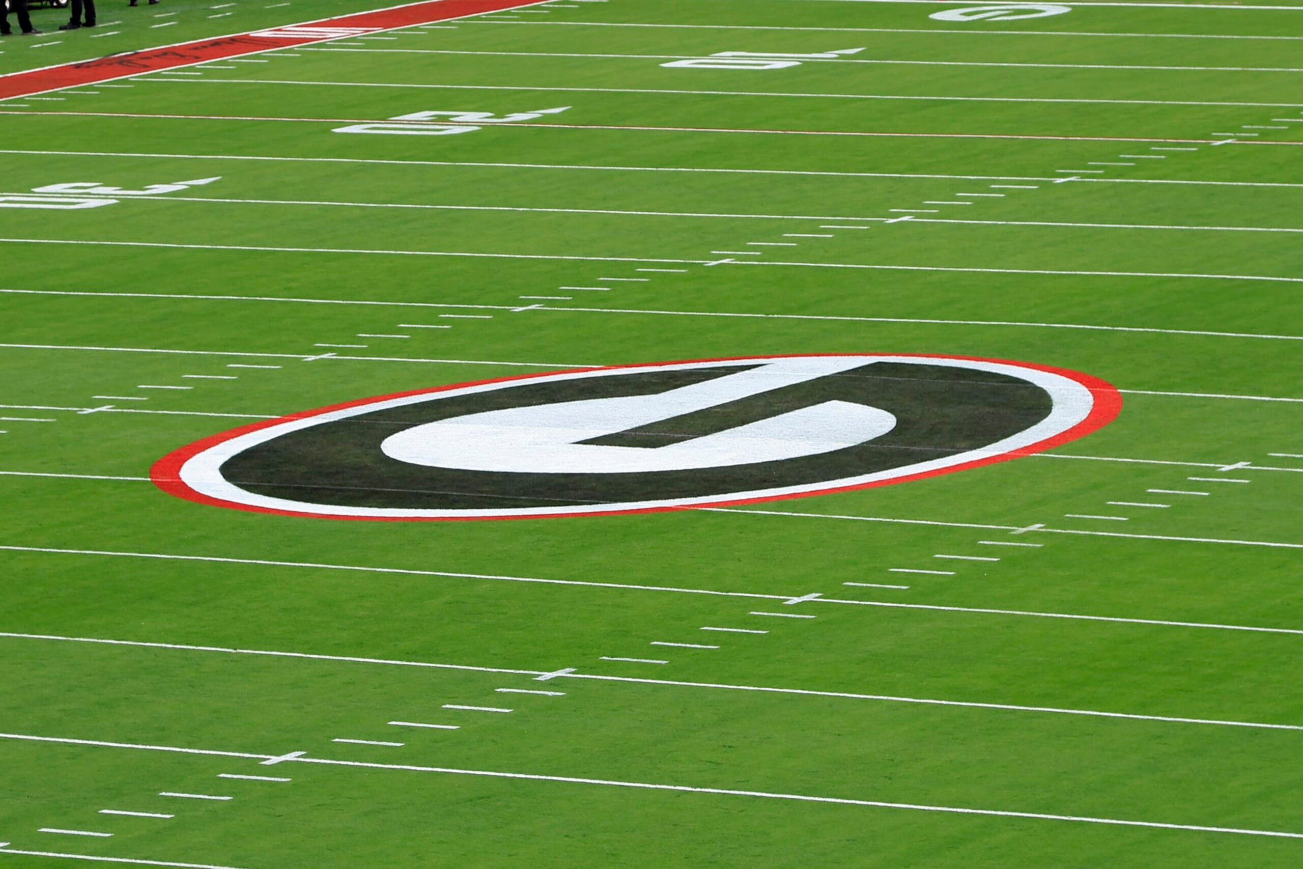 ATHENS, GA - NOVEMBER 05: The UGA logo on the field before the Saturday afternoon college football game between the University of Georgia Bulldogs and the University of Tennessee Volunteers on November 5, 2022 at Sanford Stadium in Athens, GA. (Photo by David J. Griffin/Icon Sportswire via Getty Images) ATHENS, GA - NOVEMBER 05: The UGA logo on the field before the Saturday afternoon college football game between the University of Georgia Bulldogs and the University of Tennessee Volunteers on November 5, 2022 at Sanford Stadium in Athens, GA. (Photo by David J. Griffin/Icon Sportswire via Getty Images)