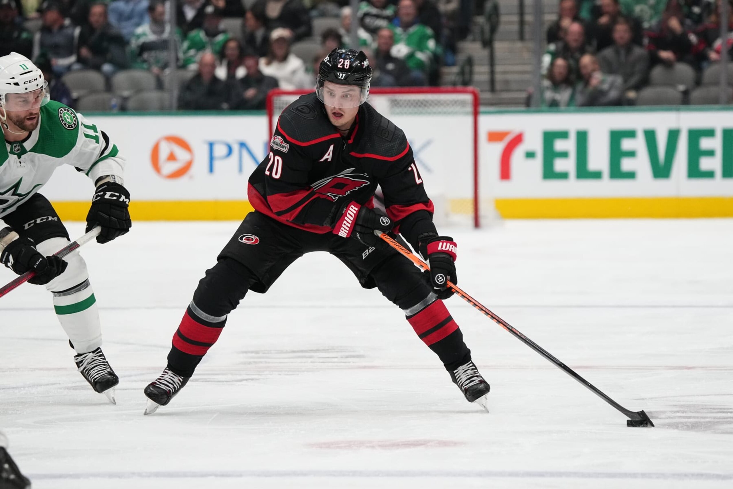 DALLAS, TX - JANUARY 25: Sebastian Aho #20 of the Carolina Hurricanes skates against the Dallas Stars at the American Airlines Center on January 25, 2023 in Dallas, Texas. (Photo by Glenn James/NHLI via Getty Images)