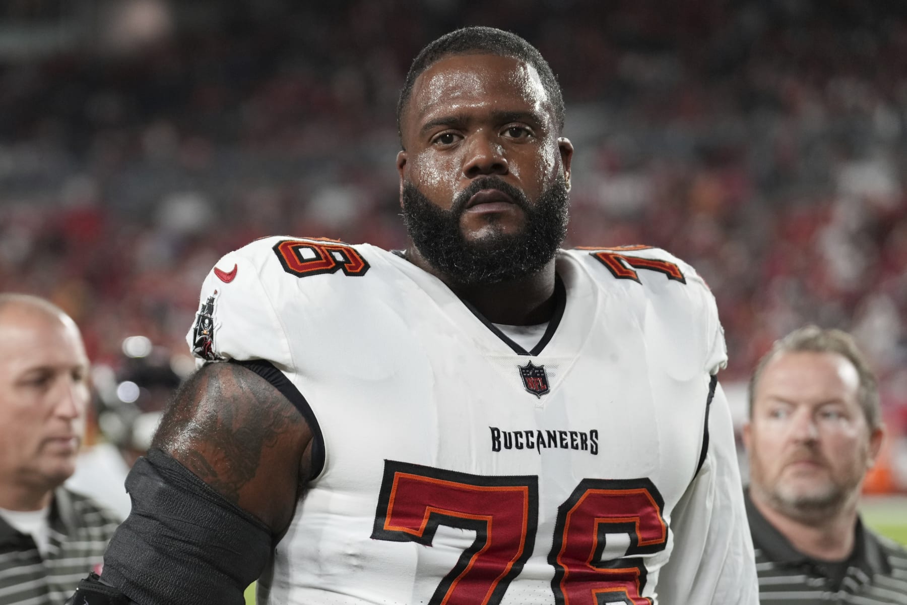 Tampa Bay Buccaneers offensive tackle Donovan Smith (76) walks toward the locker room after warmups before an NFL football game against the Kansas City Chiefs, Sunday, Oct. 2, 2022 in Tampa, Fla. The Chiefs defeat the Buccaneers 41-31. (AP Photo/Peter Joneleit)