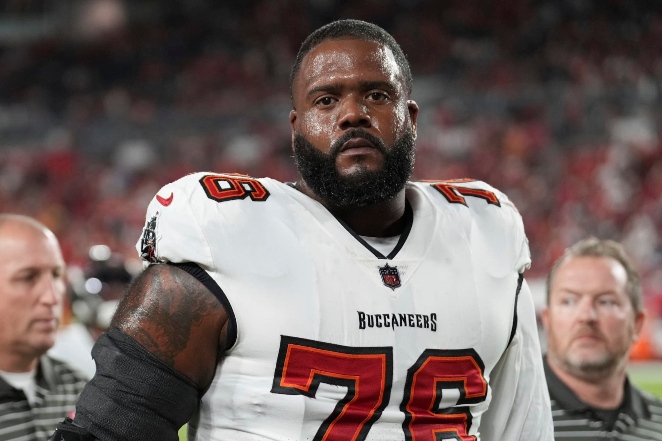 Tampa Bay Buccaneers offensive tackle Donovan Smith (76) walks toward the locker room after warmups before an NFL football game against the Kansas City Chiefs, Sunday, Oct. 2, 2022 in Tampa, Fla. The Chiefs defeat the Buccaneers 41-31. (AP Photo/Peter Joneleit)