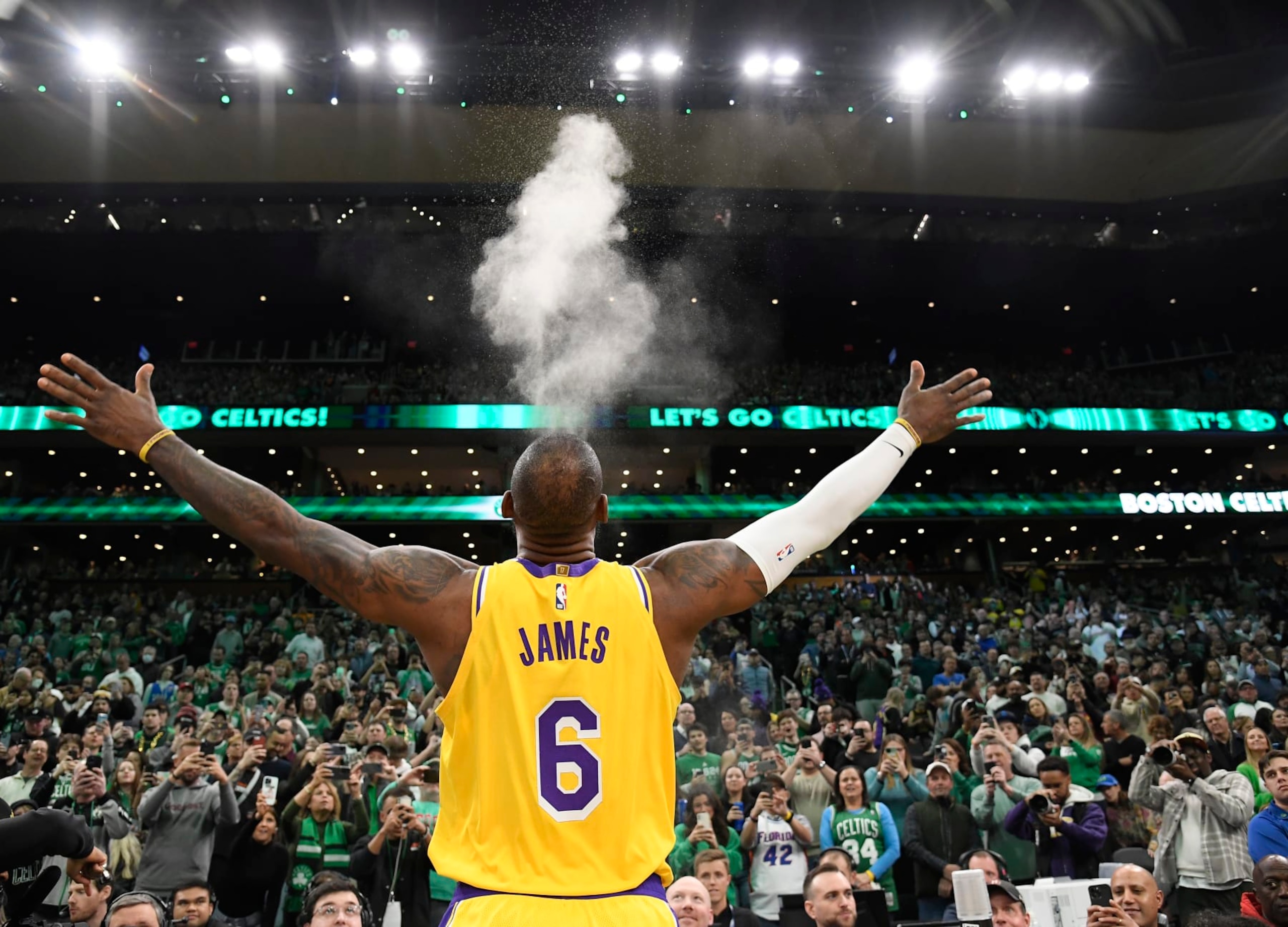 BOSTON, MA - JANUARY 28: LeBron James #6 of the Los Angeles Lakers throws powder before the game against the Boston Celtics on January 28, 2023 at the TD Garden in Boston, Massachusetts.  NOTE TO USER: User expressly acknowledges and agrees that, by downloading and or using this photograph, User is consenting to the terms and conditions of the Getty Images License Agreement. Mandatory Copyright Notice: Copyright 2023 NBAE  (Photo by Brian Babineau/NBAE via Getty Images)