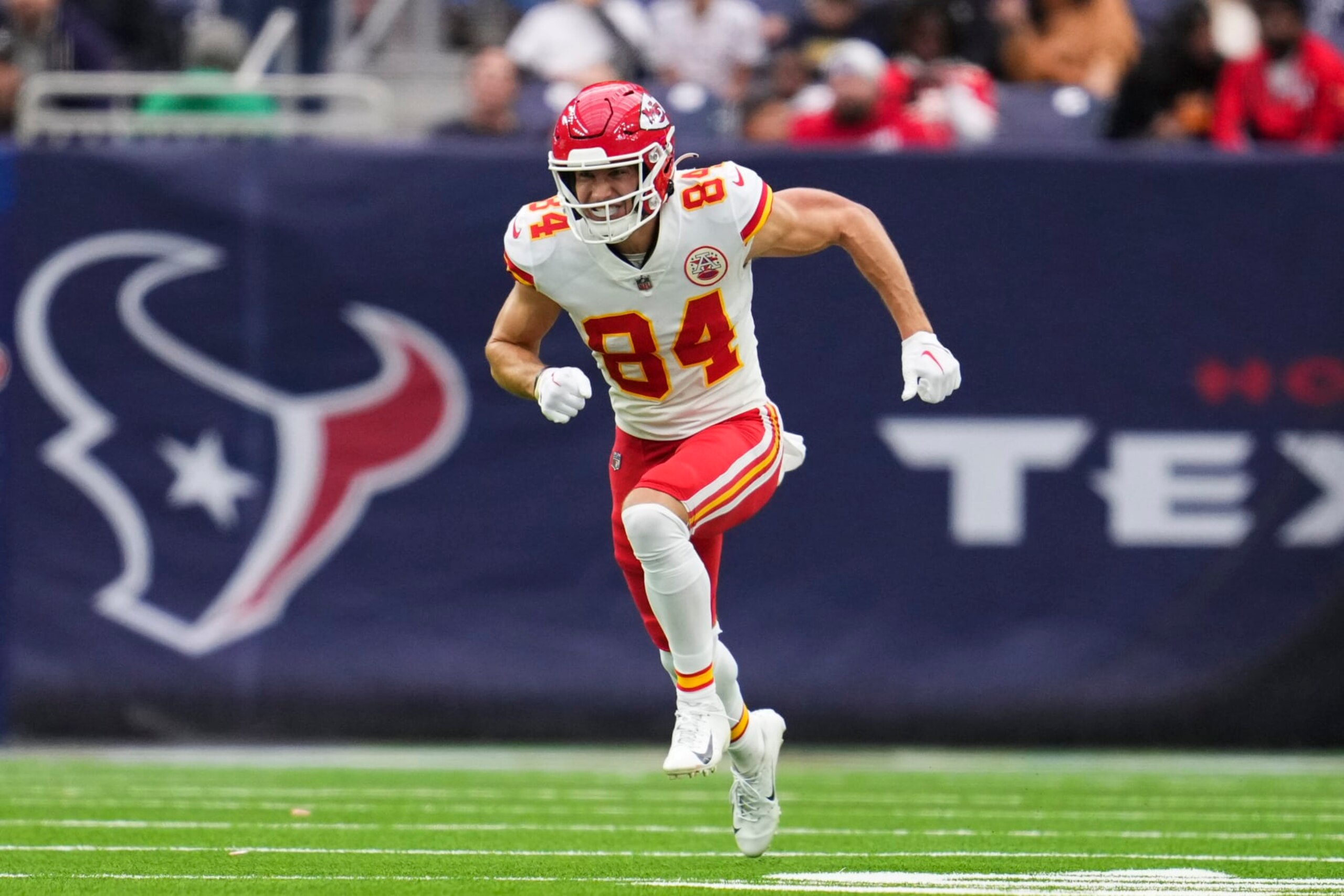 HOUSTON, TX - DECEMBER 18: Justin Watson #84 of the Kansas City Chiefs defends against the Houston Texans at NRG Stadium on December 18, 2022 in Houston, Texas. (Photo by Cooper Neill/Getty Images)