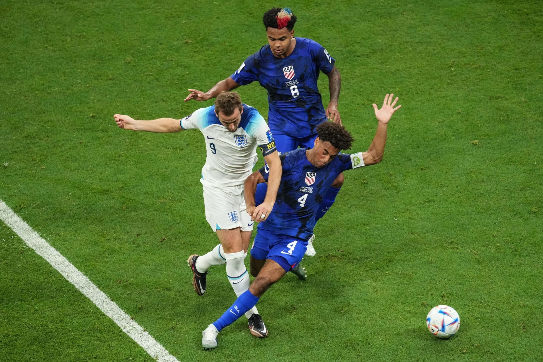 Harry Kane L of England, Weston McKennie Top and Tyler Adams of the United States compete during the Group B match between England and the United States at the 2022 FIFA World Cup at Al Bayt Stadium in Al Khor, Qatar, Nov. 25, 2022. (Photo by Pan Yulong/Xinhua via Getty Images)