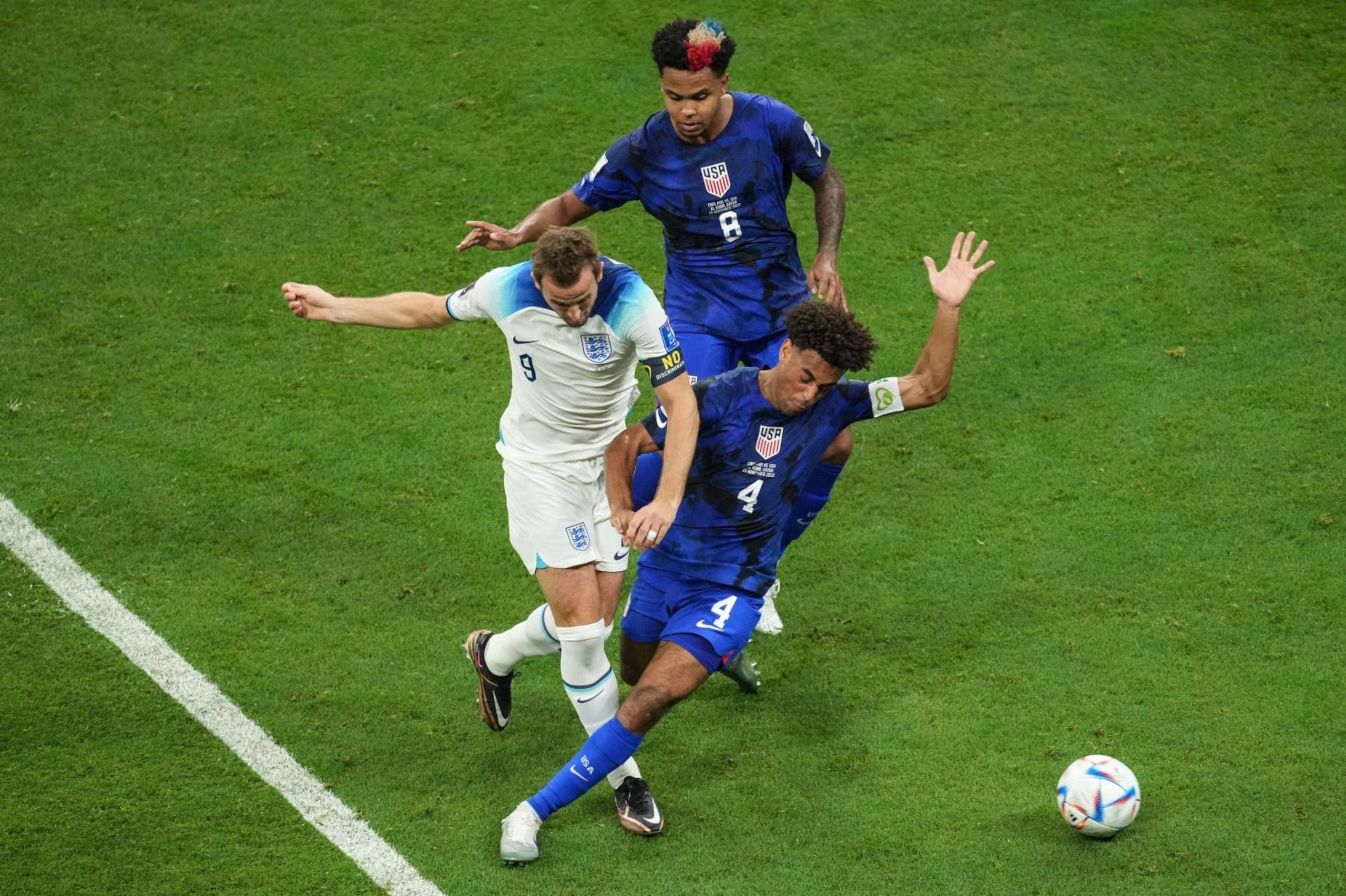 Harry Kane L of England, Weston McKennie Top and Tyler Adams of the United States compete during the Group B match between England and the United States at the 2022 FIFA World Cup at Al Bayt Stadium in Al Khor, Qatar, Nov. 25, 2022. (Photo by Pan Yulong/Xinhua via Getty Images)